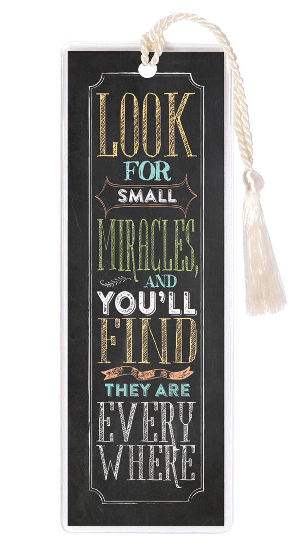 An elegant double-sided bookmark, Look For Small Miracles, is protected by a clear vinyl sleeve and finished with a tassel.