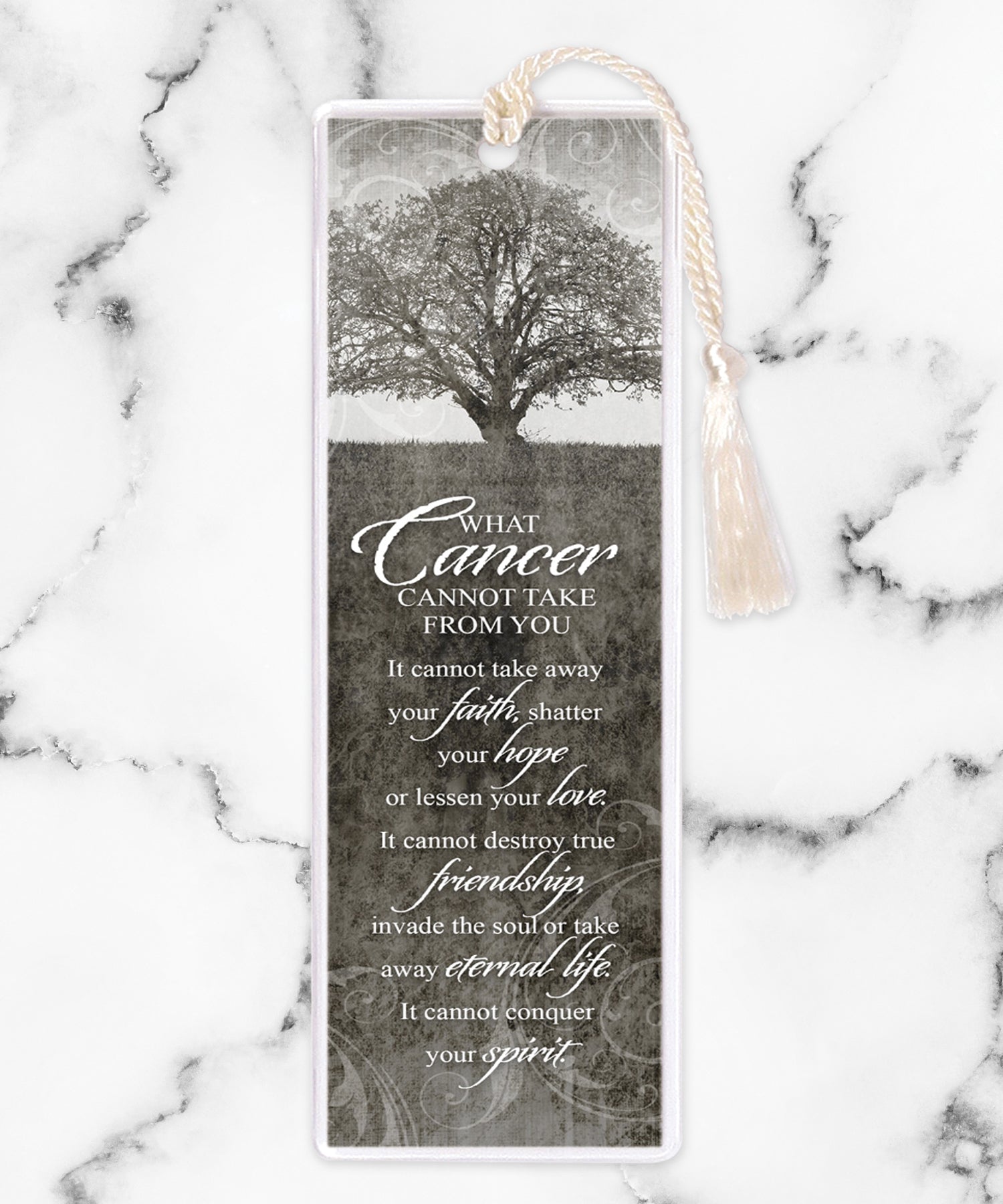 An elegant double-sided bookmark, Cancer Tree, is protected by a clear vinyl sleeve and finished with a tassel.