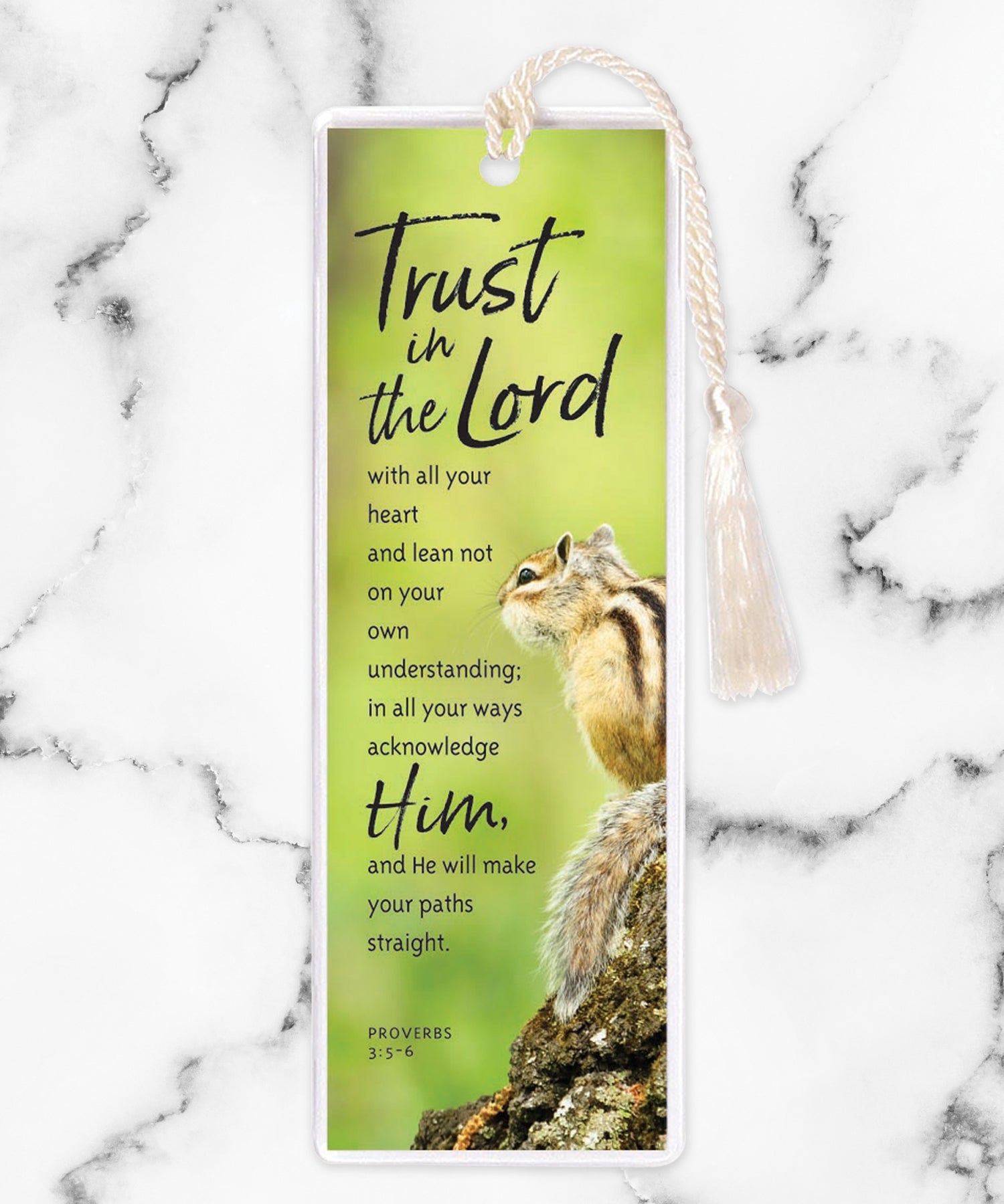 An elegant double-sided bookmark, Trust in the Lord, is protected by a clear vinyl sleeve and finished with a tassel.