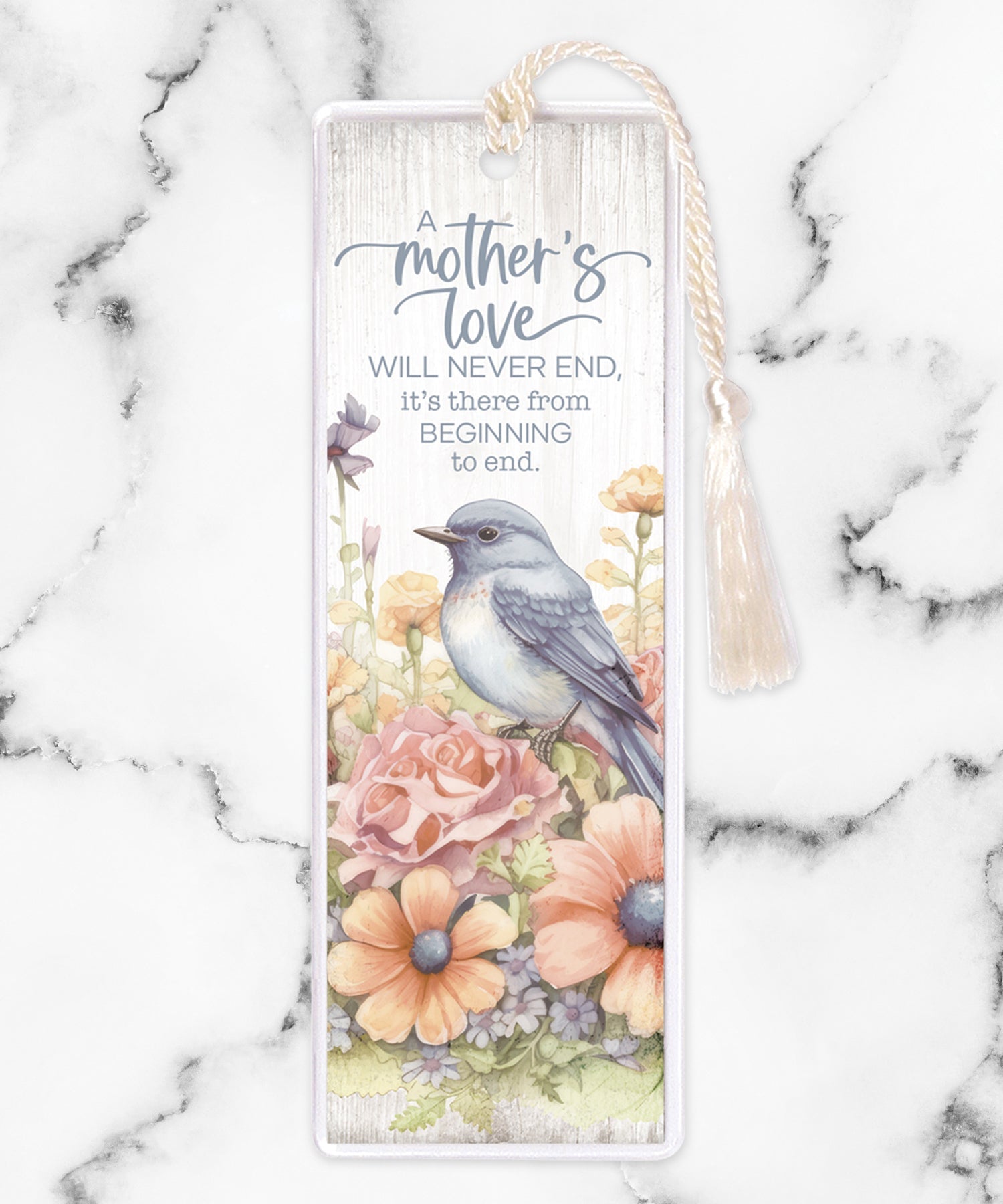 An elegant double-sided bookmark, A Mother's Love, is protected by a clear vinyl sleeve and finished with a tassel.
