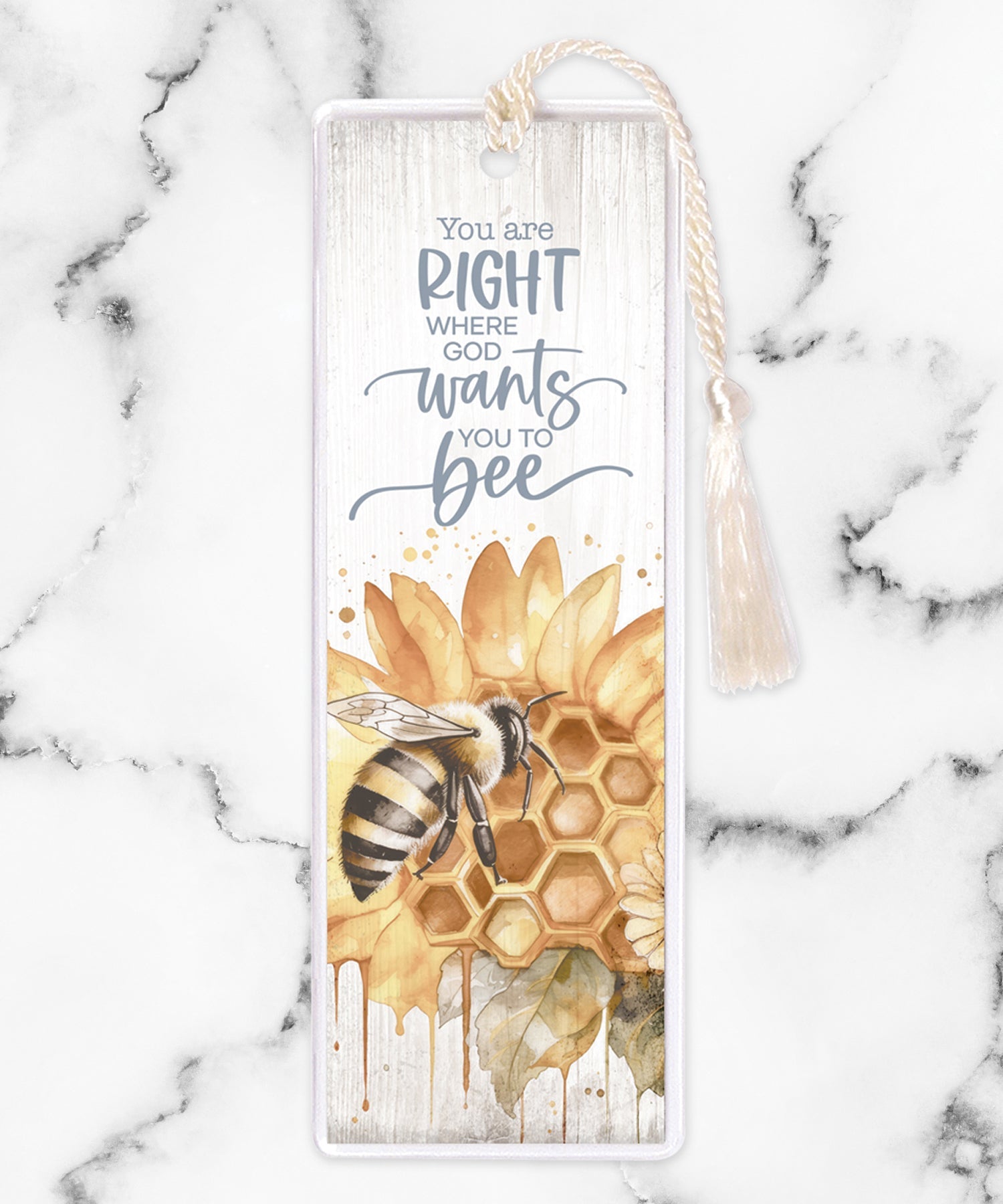 An elegant double-sided bookmark, You Are Right Where God, is protected by a clear vinyl sleeve and finished with a tassel.