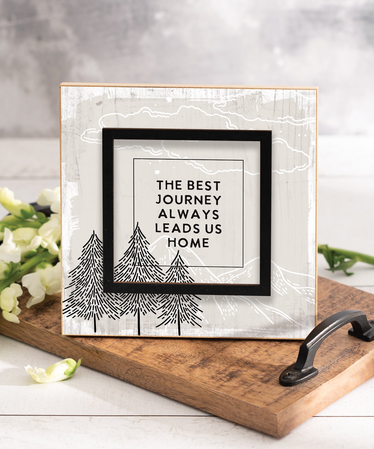 6x6 Layered Grace Plaque with neutral floral background, black laser-cut accent, and the message “The best journey always leads us home.”