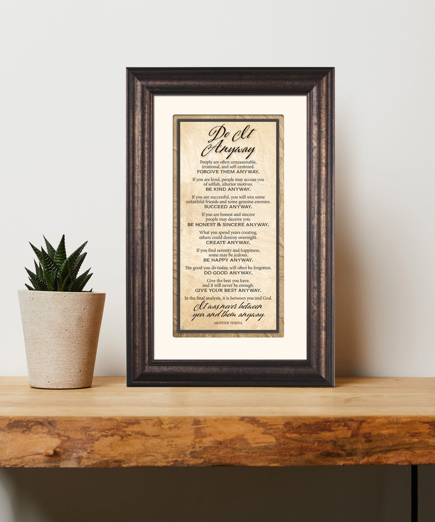 Do It Anyway Framed Art has elegant typography and a neutral design. It is framed in a classic wood frame with a warm finish and double matting.