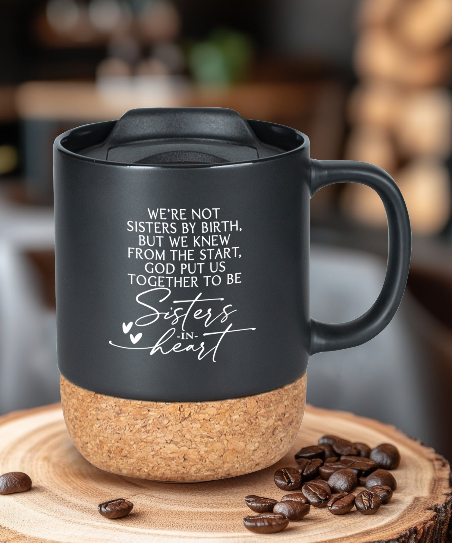 Cork bottom mug with a push-on, slide-locking lid featuring Sisters in Heart.