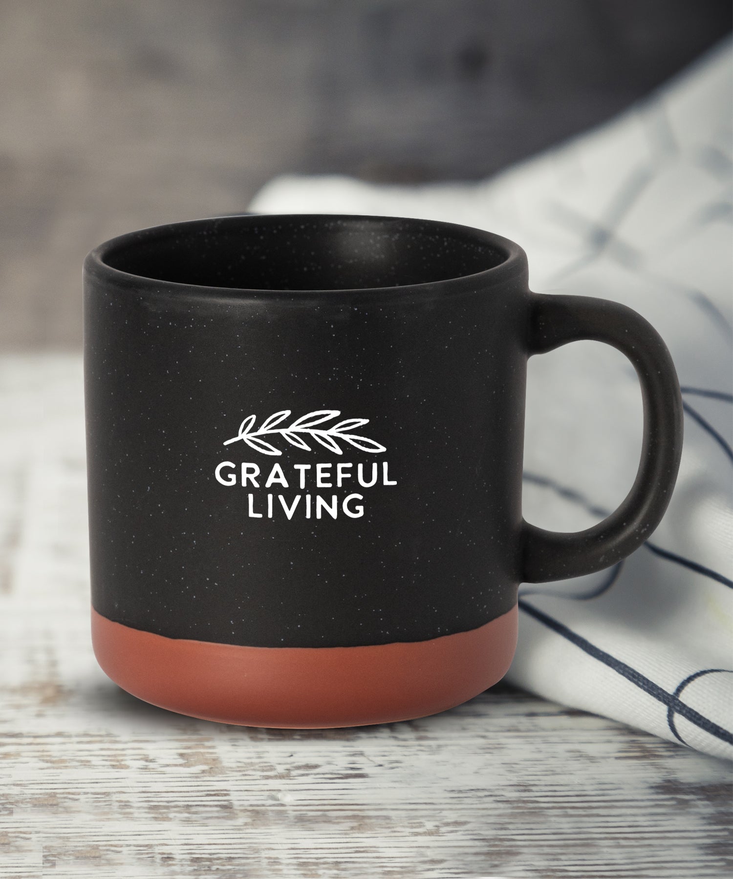 Grateful Living Hearthside ceramic mug with speckled finish, natural baked bottom, and faith-filled gratitude message, 14 oz