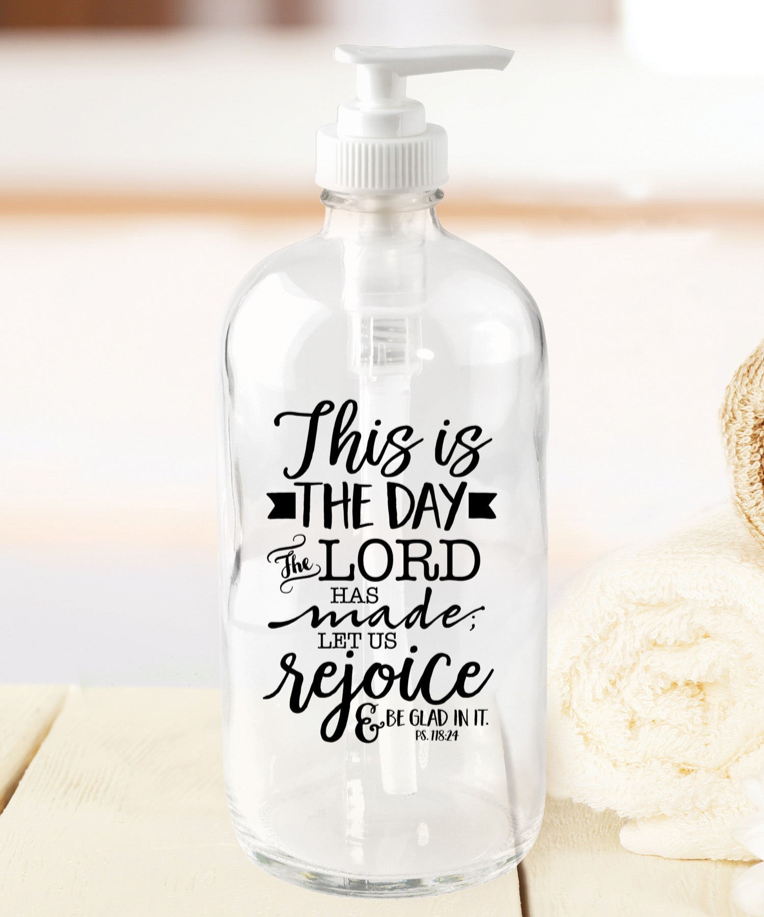 This is the day glass soap dispenser with Psalm 118:24 scripture on clear glass bottle and plastic pump, 18 oz