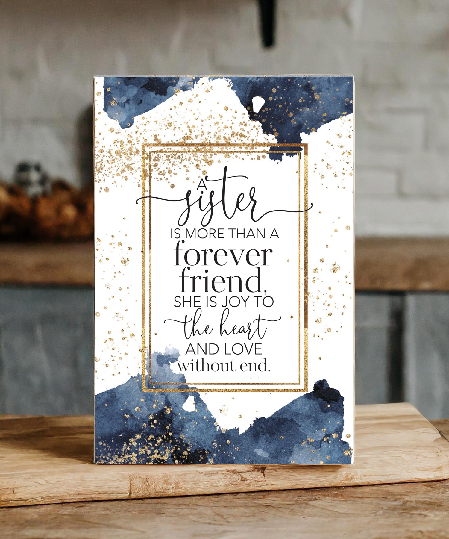 A Sister Is More Than a Friend 6x9 MDF plaque with watercolor artwork, black vinyl edge, and inspirational sister message
