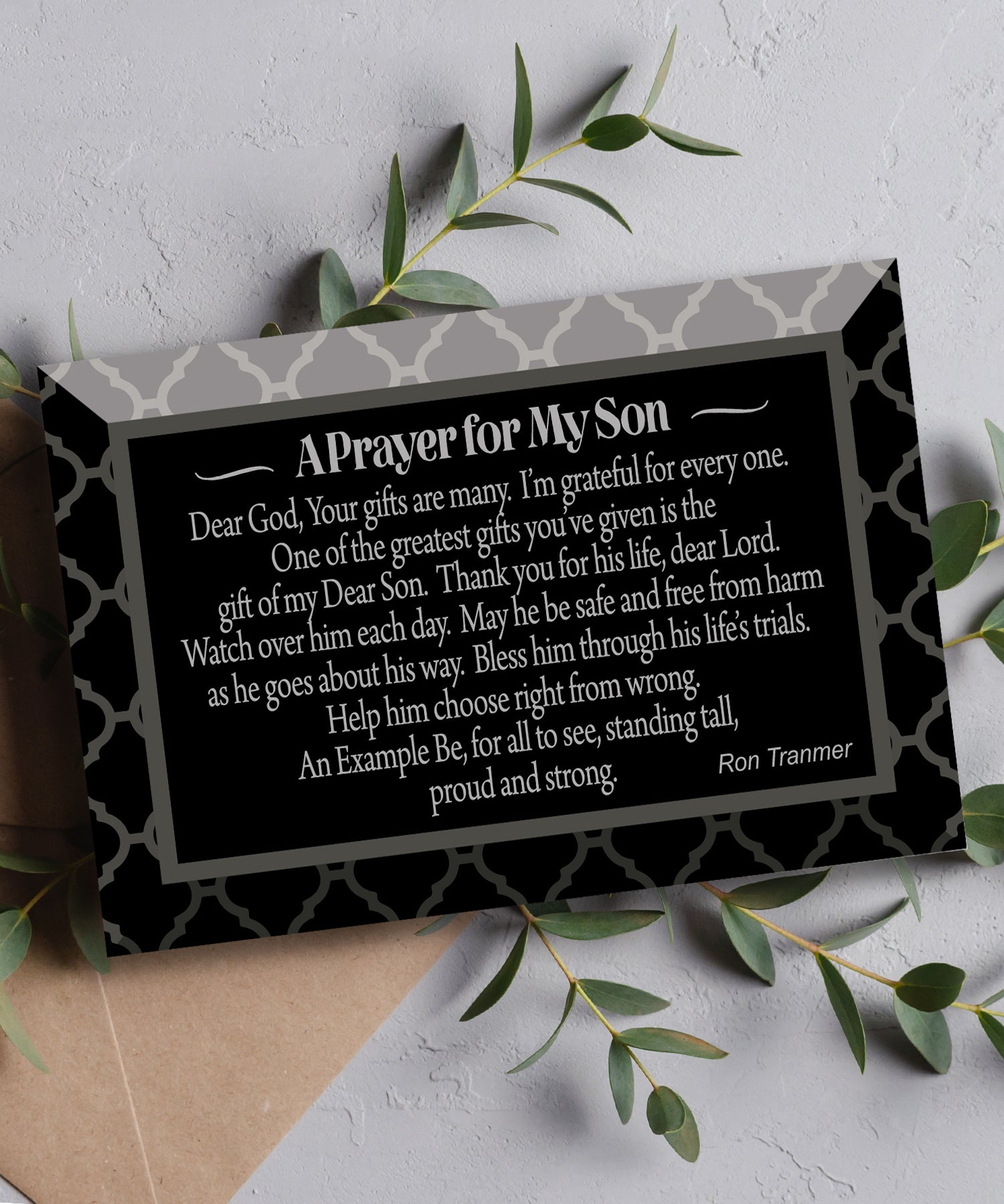 Prayer for My Son Glass Plaque, which has smooth beveled edges and a screen-printed design, is perfect for display on a shelf.