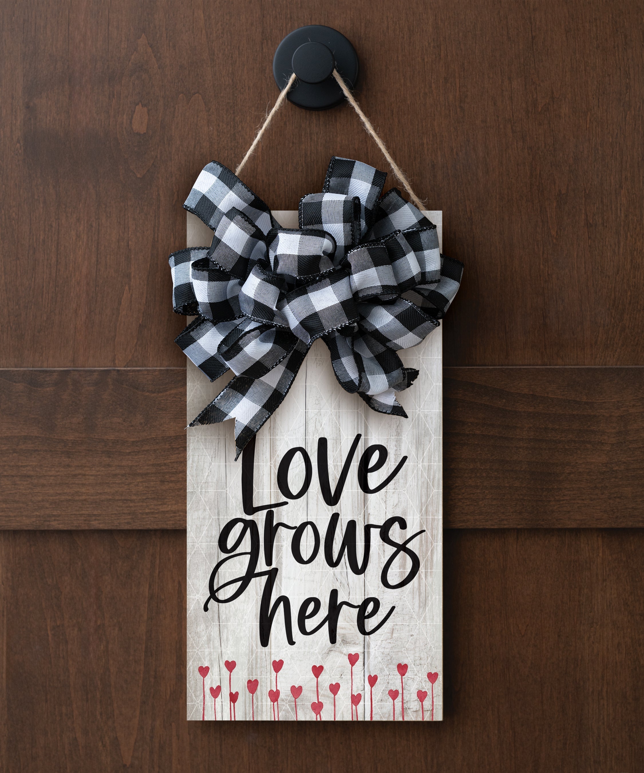 Love Grows Here hangable blessing with jute twine cord, fabric bow, and full-color printed artwork