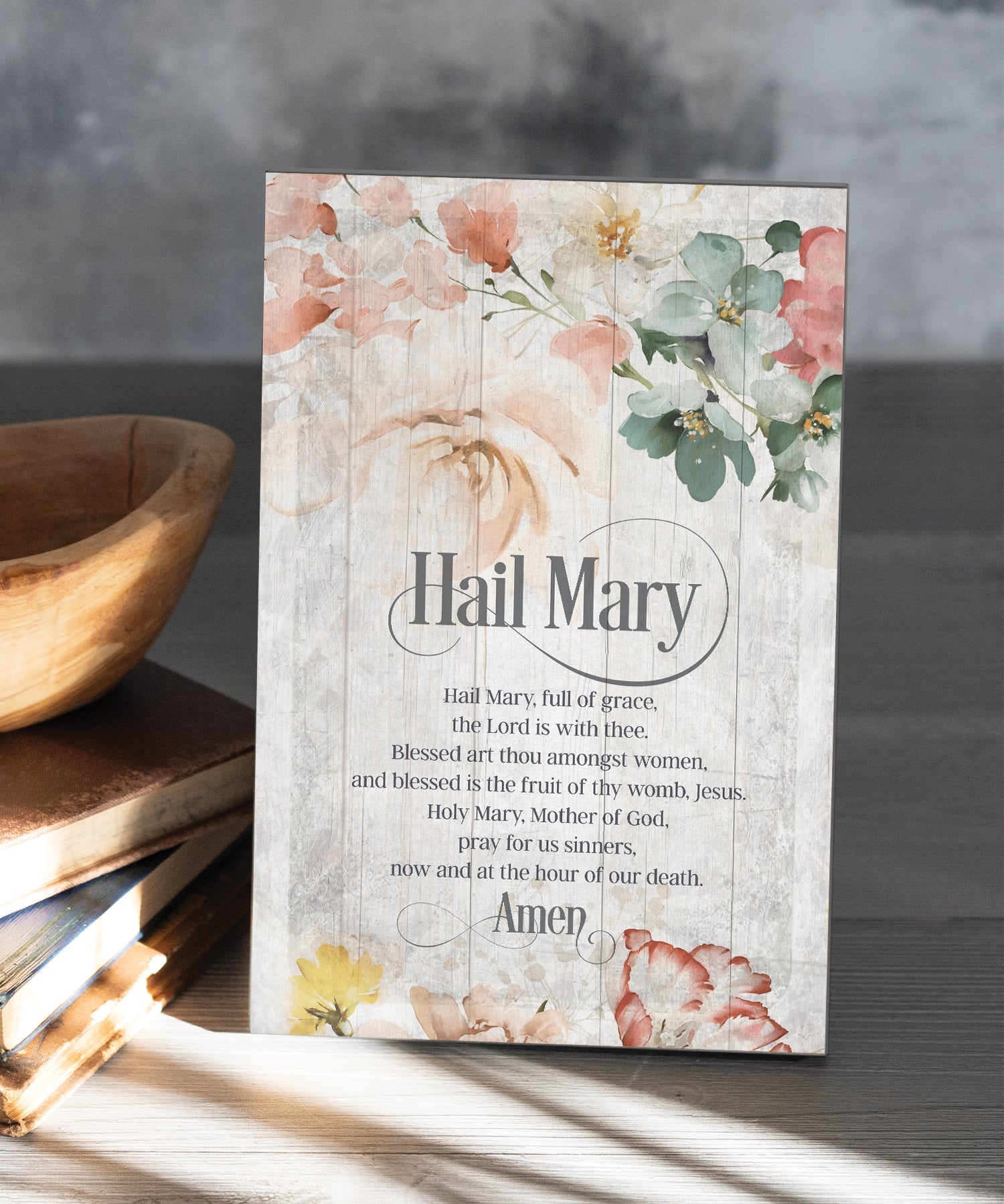 Hail Mary 6x9 MDF Plaque has natural edges, muted tones, and inspirational prayer reflecting our faith in God. The plaque features full-color printing and a metal hanger and easel back.