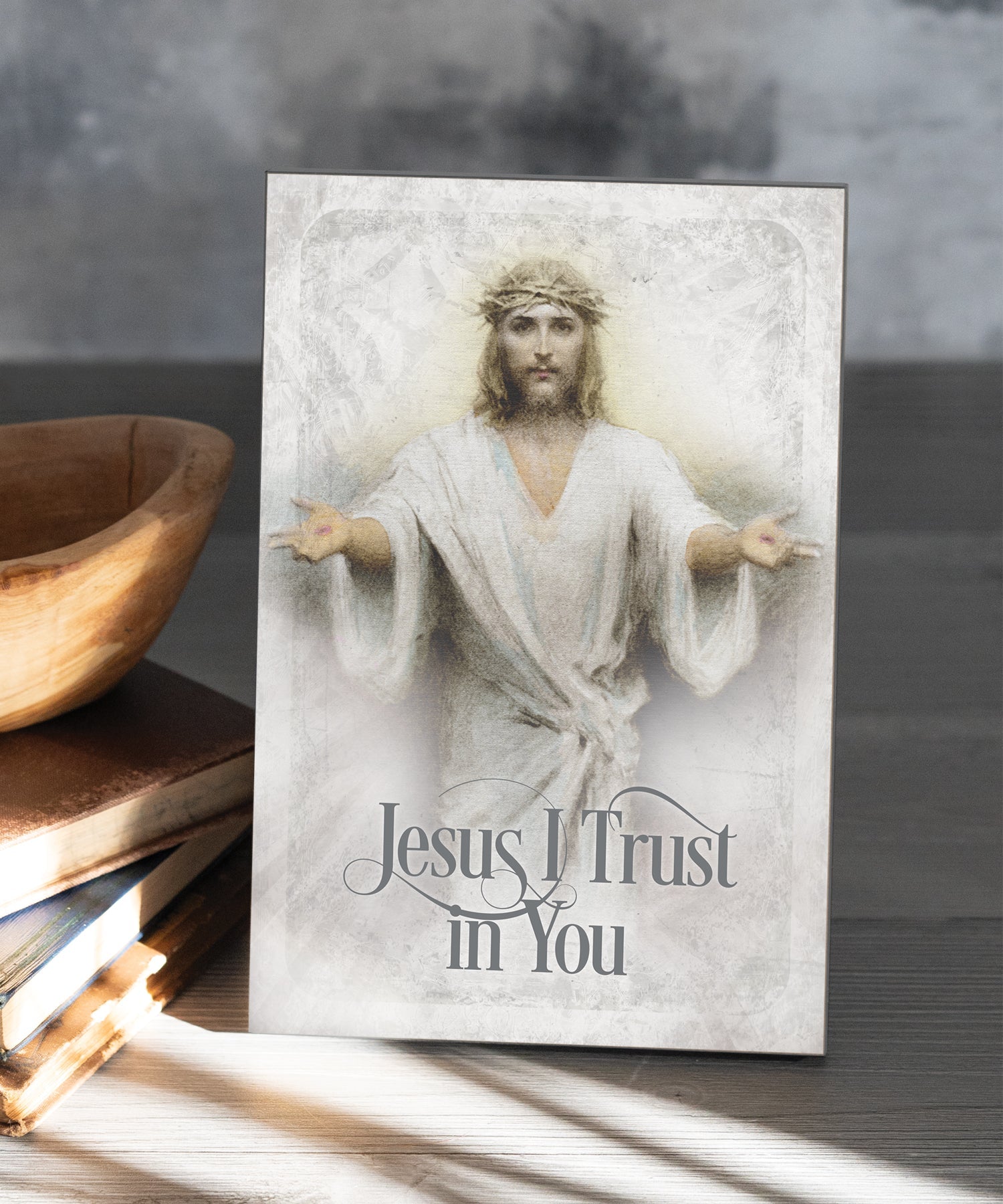 Jesus I Trust in You 6x9 MDF Plaque has natural edges, muted tones, and inspirational imagery reflecting our faith in God. The plaque features full-color printing and a metal hanger and easel back.