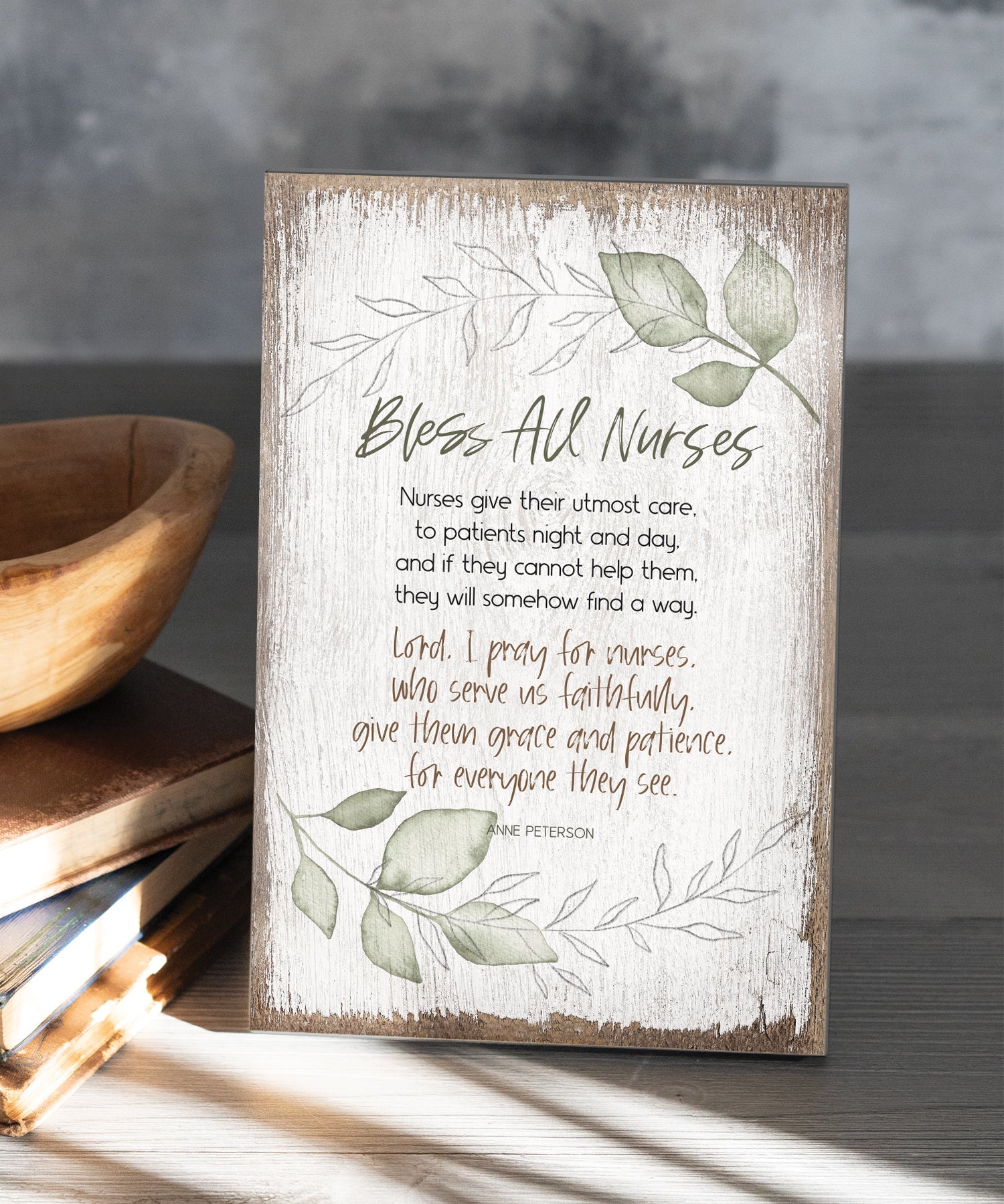 Bless All Nurses 6x9 MDF Plaque has silver edges, inspirational verse, and a modern farmhouse style to fit any decor. The plaque features full-color printing and a metal hanger and easel back.