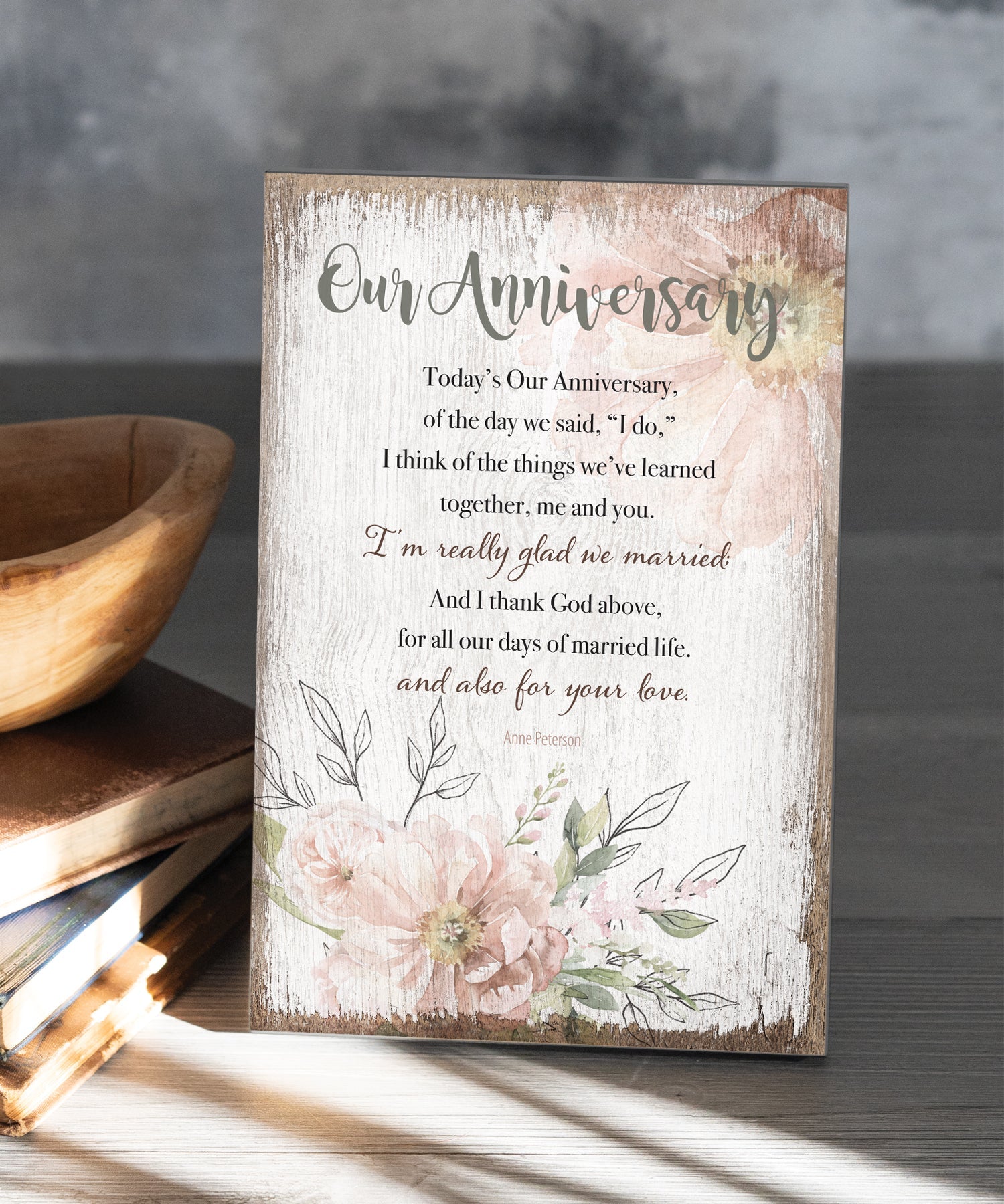Our Anniversary 6x9 MDF Plaque has silver edges, inspirational verse, and a modern farmhouse style to fit any decor. The plaque features full-color printing and a metal hanger and easel back.