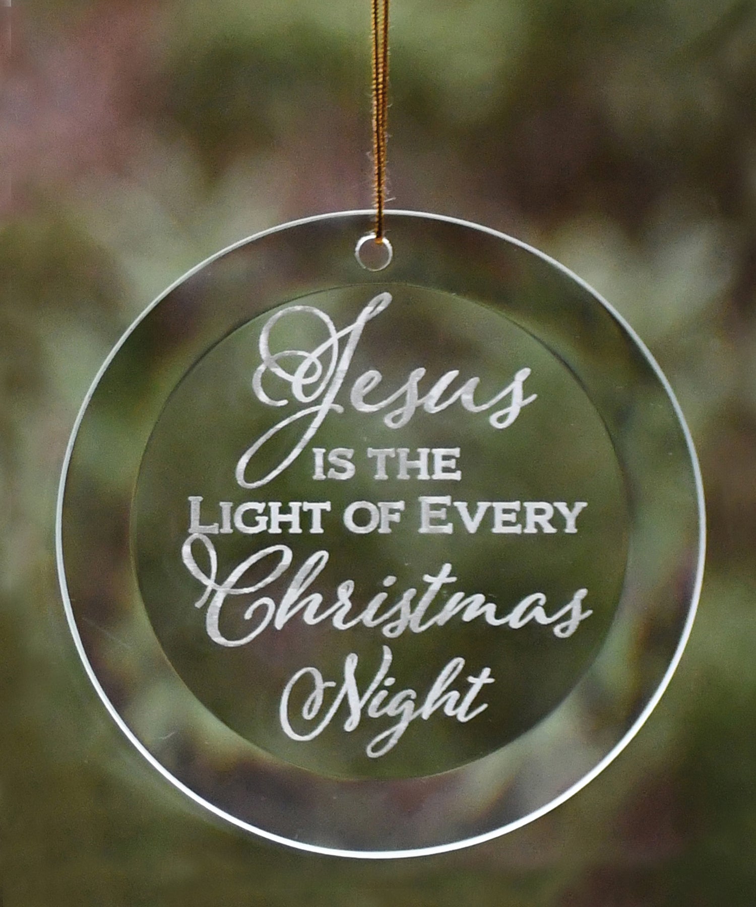 Jesus Is the Light Glass Ornament with laser-etched design and gold string hanger, perfect for Christmas décor