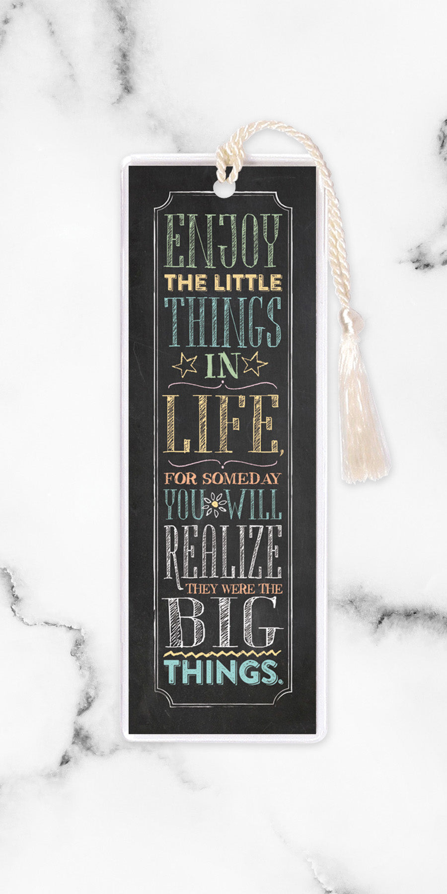 An elegant double-sided bookmark, Enjoy the Little Things, is protected by a clear vinyl sleeve and finished with a tassel.