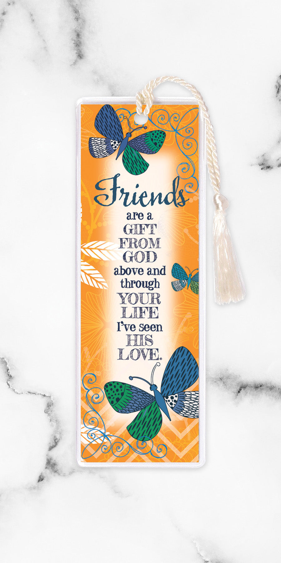 An elegant double-sided bookmark, Friends Are a Gift, is protected by a clear vinyl sleeve and finished with a tassel.