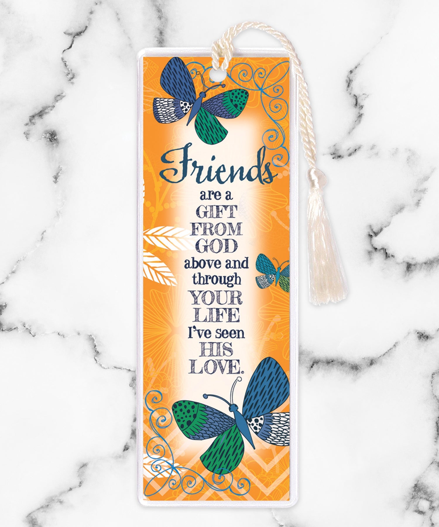 An elegant double-sided bookmark, Friends Are a Gift, is protected by a clear vinyl sleeve and finished with a tassel.