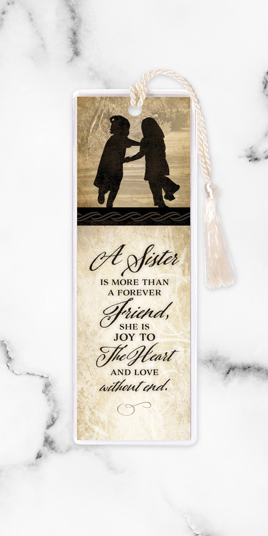 An elegant double-sided bookmark, Sister, is protected by a clear vinyl sleeve and finished with a tassel.
