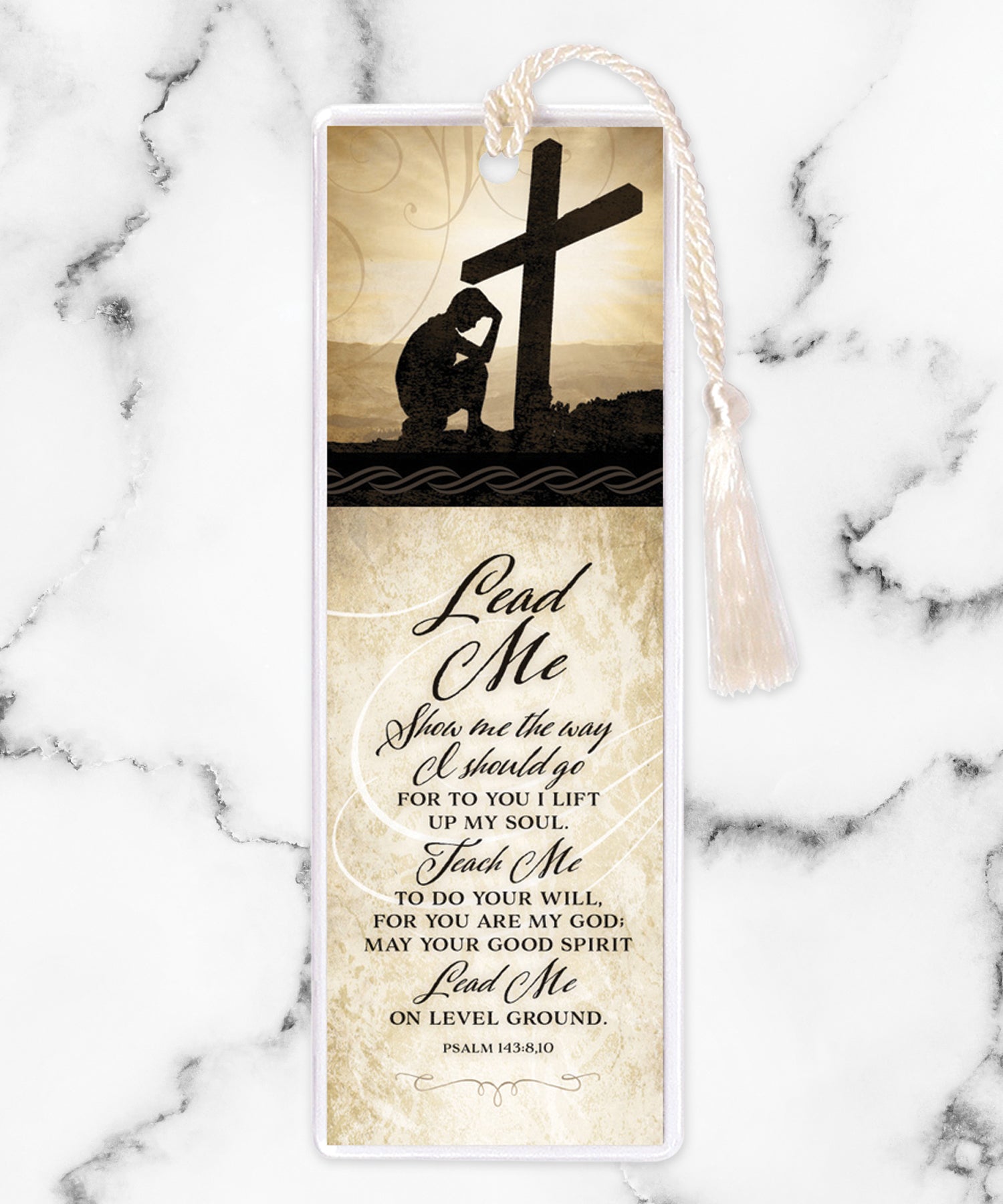 An elegant double-sided bookmark, Lead Me, is protected by a clear vinyl sleeve and finished with a tassel.