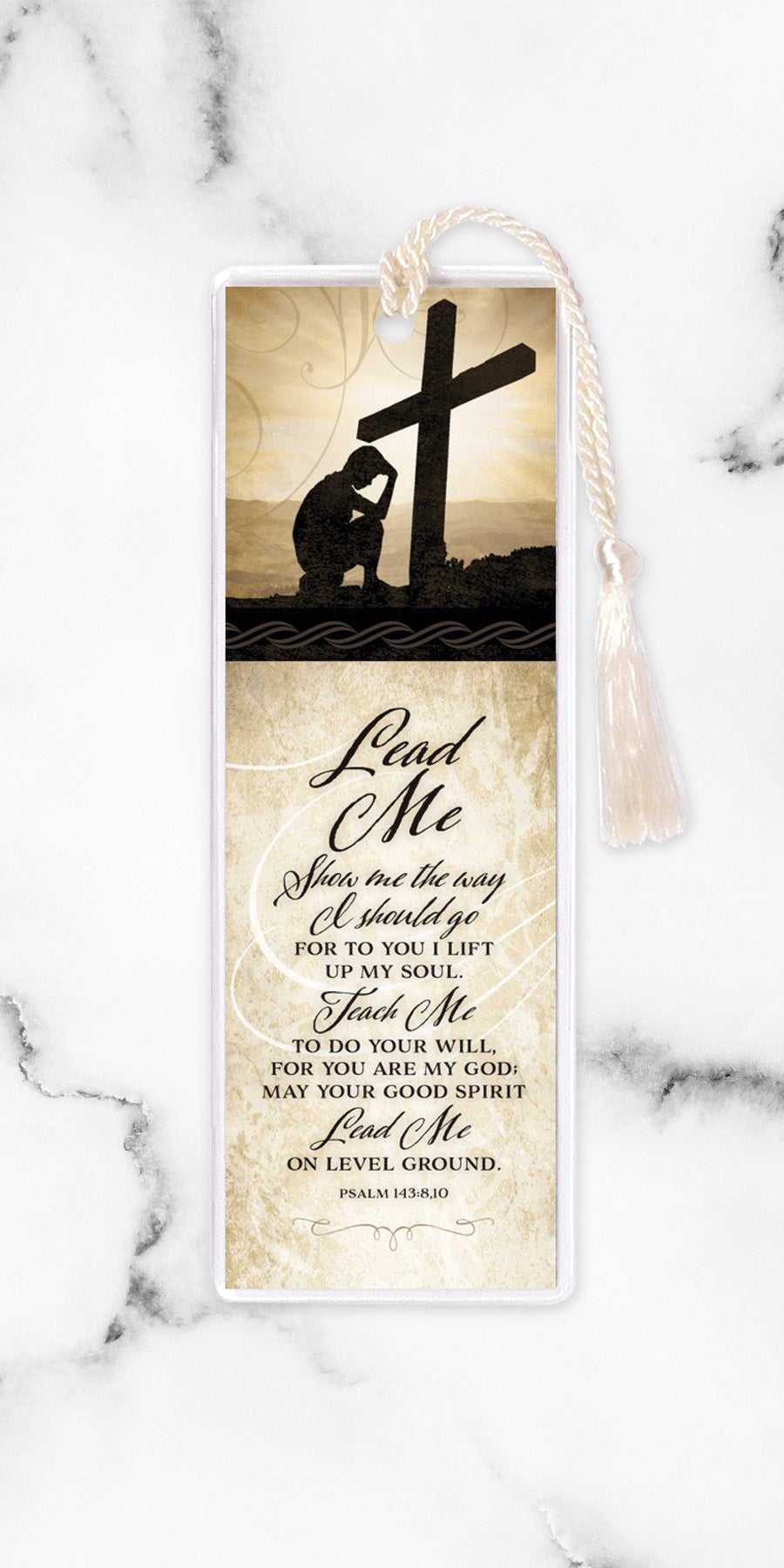 An elegant double-sided bookmark, Lead Me, is protected by a clear vinyl sleeve and finished with a tassel.