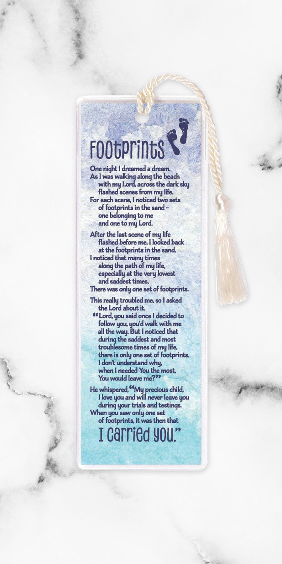 An elegant double-sided bookmark, Footprints, is protected by a clear vinyl sleeve and finished with a tassel.