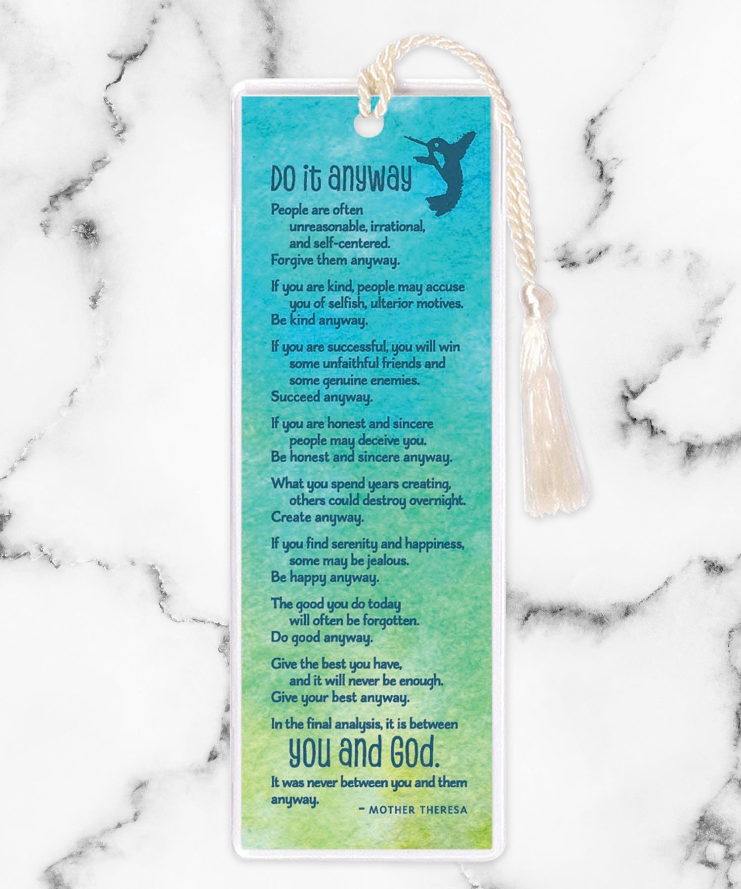 An elegant double-sided bookmark, Do It Anyway, is protected by a clear vinyl sleeve and finished with a tassel.