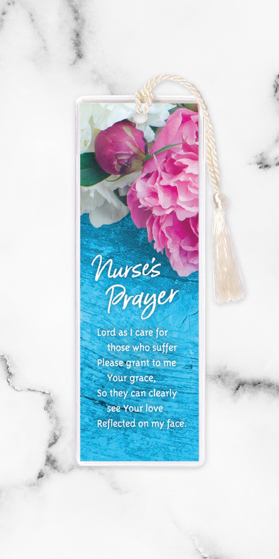 An elegant double-sided bookmark, Nurse's Prayer, is protected by a clear vinyl sleeve and finished with a tassel.