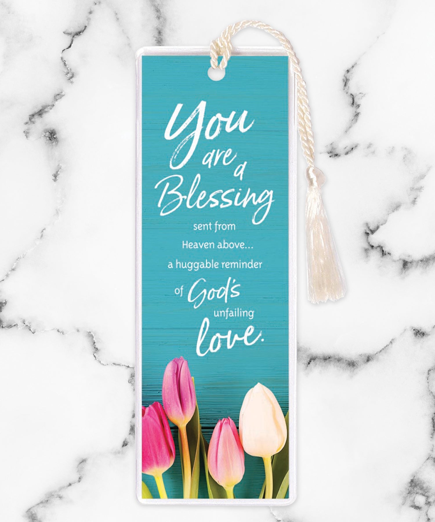 An elegant double-sided bookmark, You Are a Blessing, is protected by a clear vinyl sleeve and finished with a tassel.
