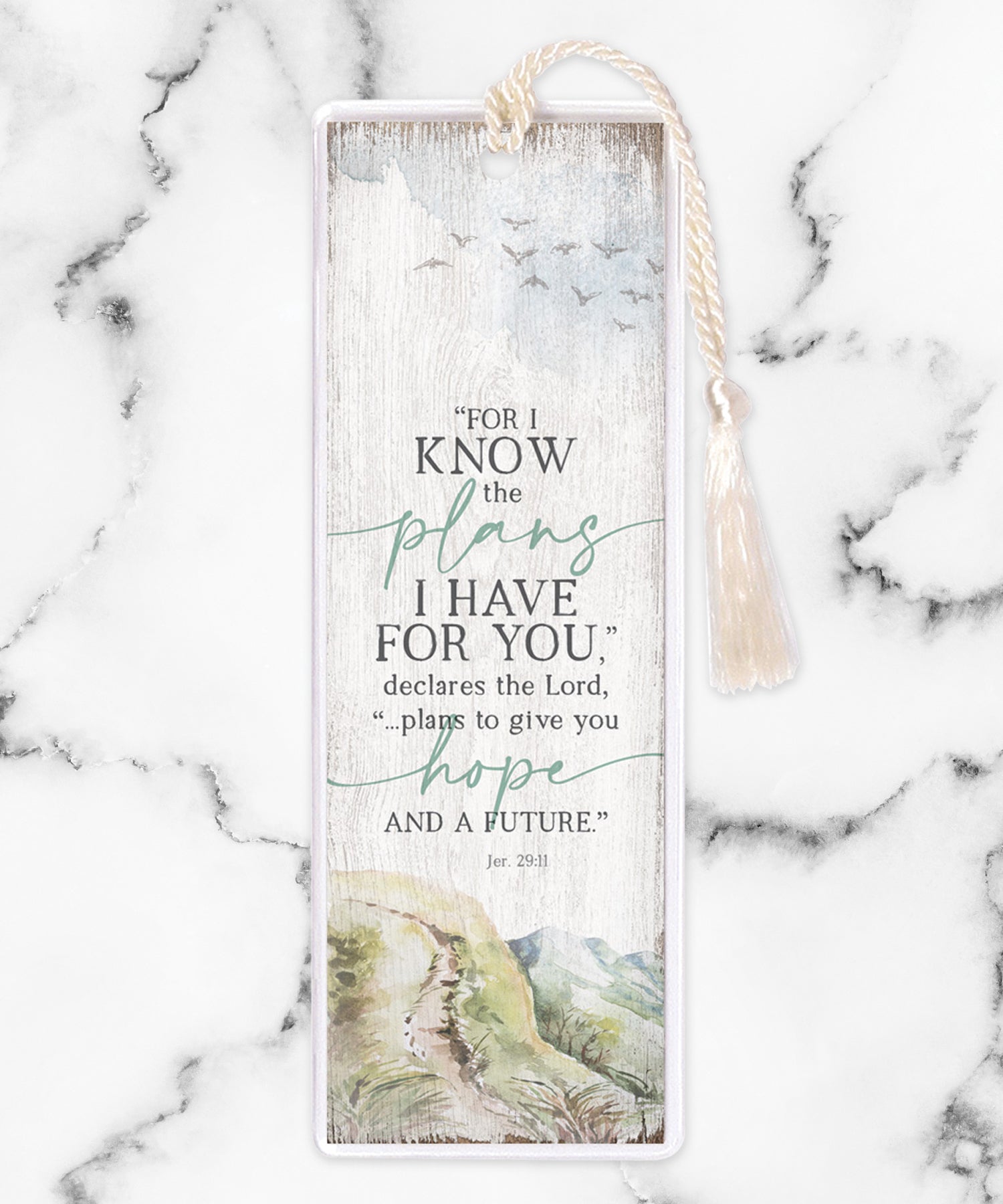 An elegant double-sided bookmark, For I Know the Plans, is protected by a clear vinyl sleeve and finished with a tassel.
