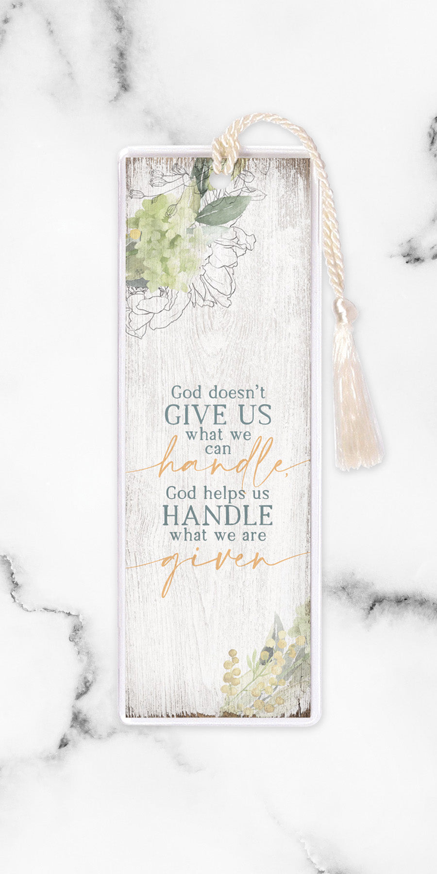 An elegant double-sided bookmark, God Doesn’t Give Us, is protected by a clear vinyl sleeve and finished with a tassel.