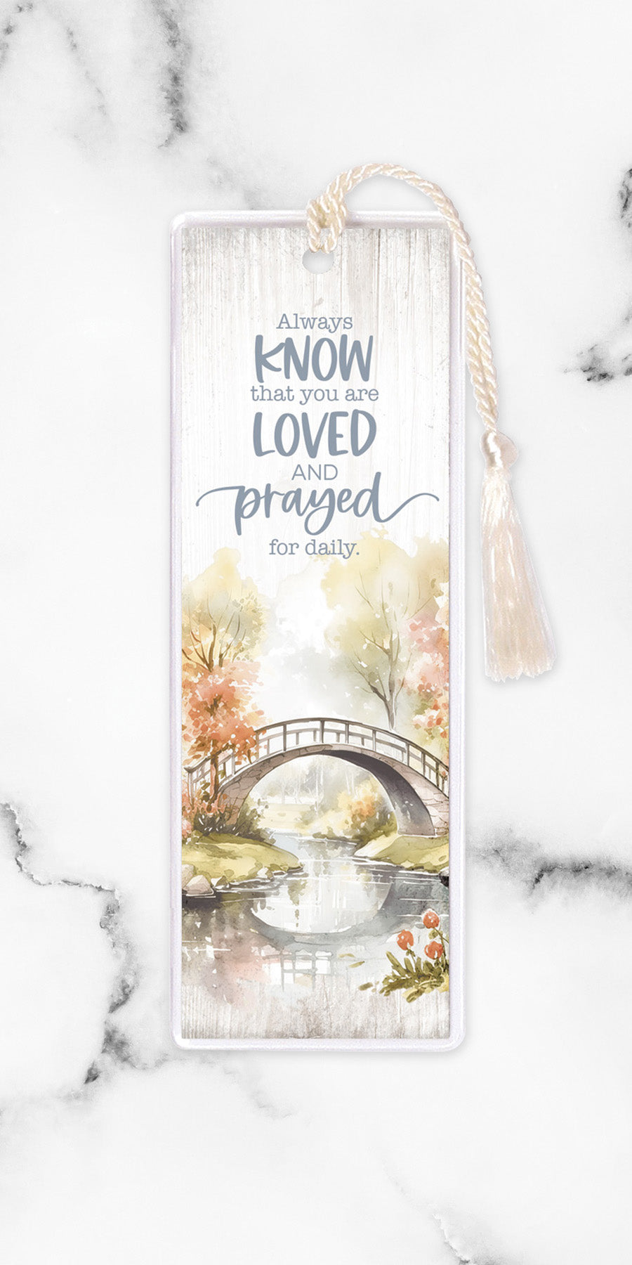 An elegant double-sided bookmark, Always Know, is protected by a clear vinyl sleeve and finished with a tassel.