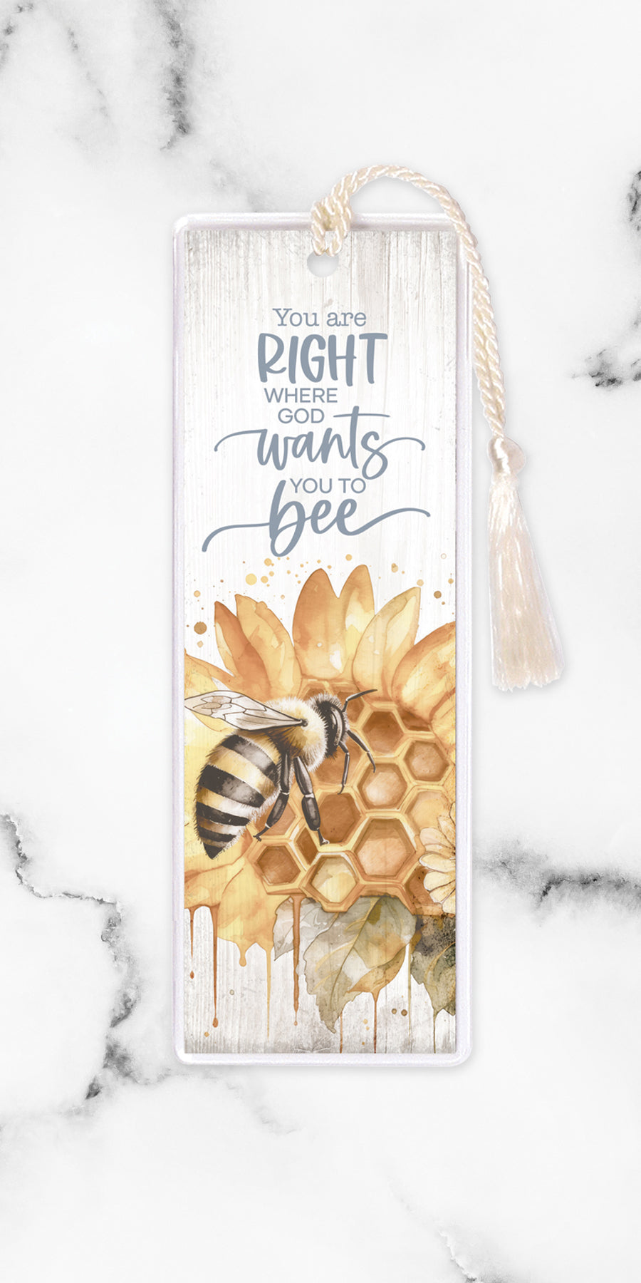 An elegant double-sided bookmark, You Are Right Where God, is protected by a clear vinyl sleeve and finished with a tassel.