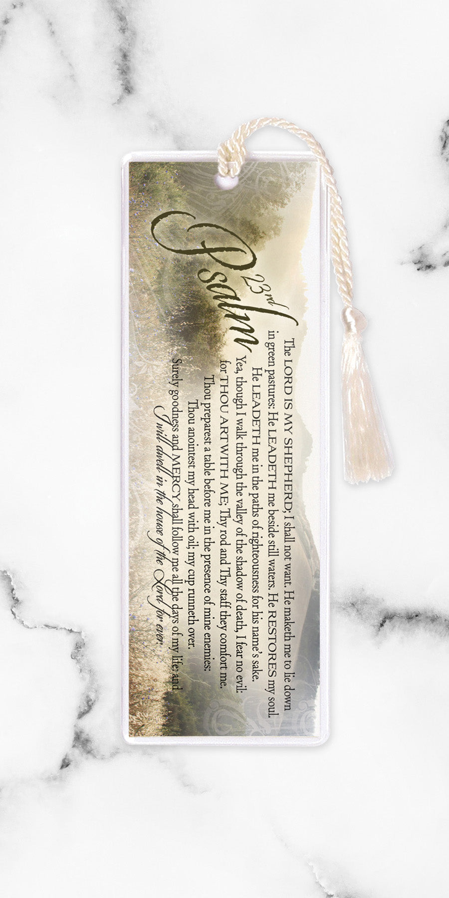An elegant double-sided bookmark, Psalm 23, is protected by a clear vinyl sleeve and finished with a tassel.