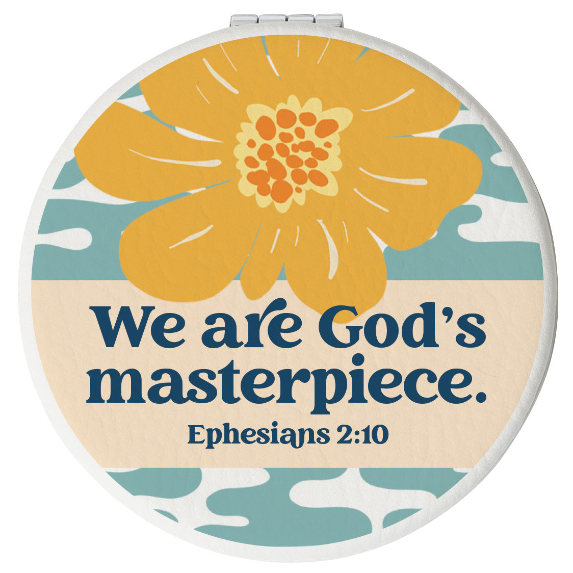 Round compact mirror with a leatherette cover, full-color “We are God’s Masterpiece” design, 1X and 2X mirrors inside, and magnetic closure.