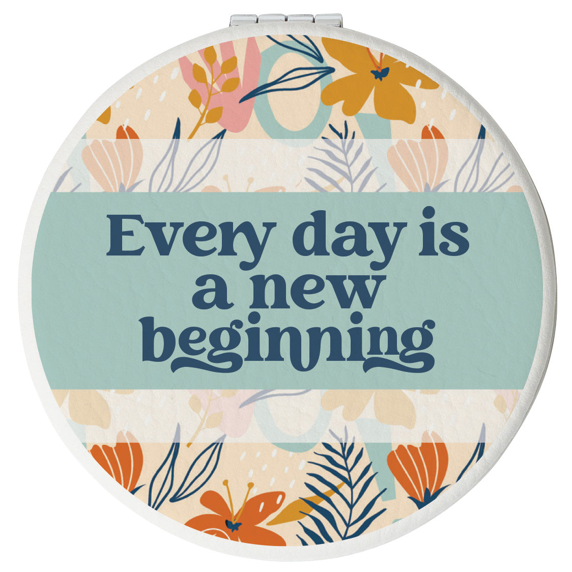 Round compact mirror with a leatherette cover, full-color “Every Day Is a New Beginning” design, 1X and 2X mirrors inside, and magnetic closure.