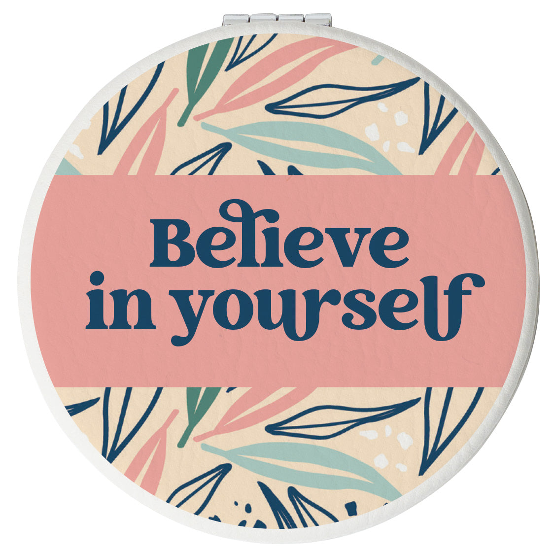 Round compact mirror with a leatherette cover, full-color “Believe in Yourself” design, 1X and 2X mirrors inside, and magnetic closure.