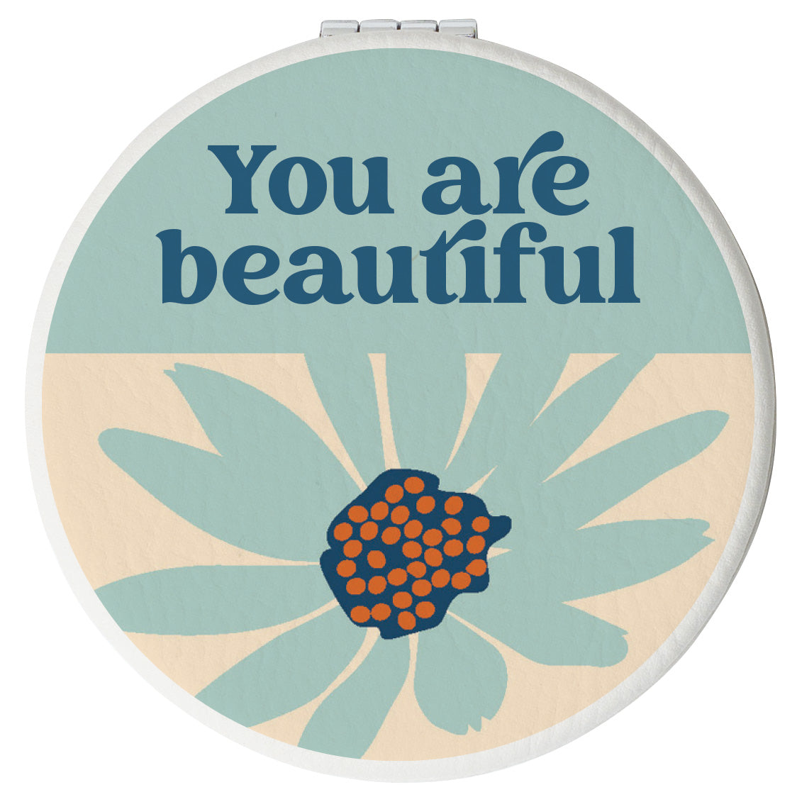 Round compact mirror with a leatherette cover, full-color “You Are Beautiful” design, 1X and 2X mirrors inside, and magnetic closure.