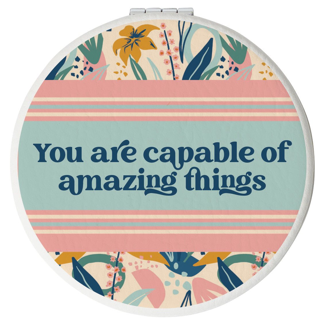 Round compact mirror with a leatherette cover, full-color “You Are Capable” design, 1X and 2X mirrors inside, and magnetic closure.