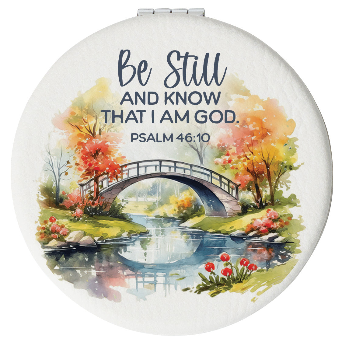 Round compact mirror with a leatherette cover, full-color “Be Still and Know” design, 1X and 2X mirrors inside, and magnetic closure.