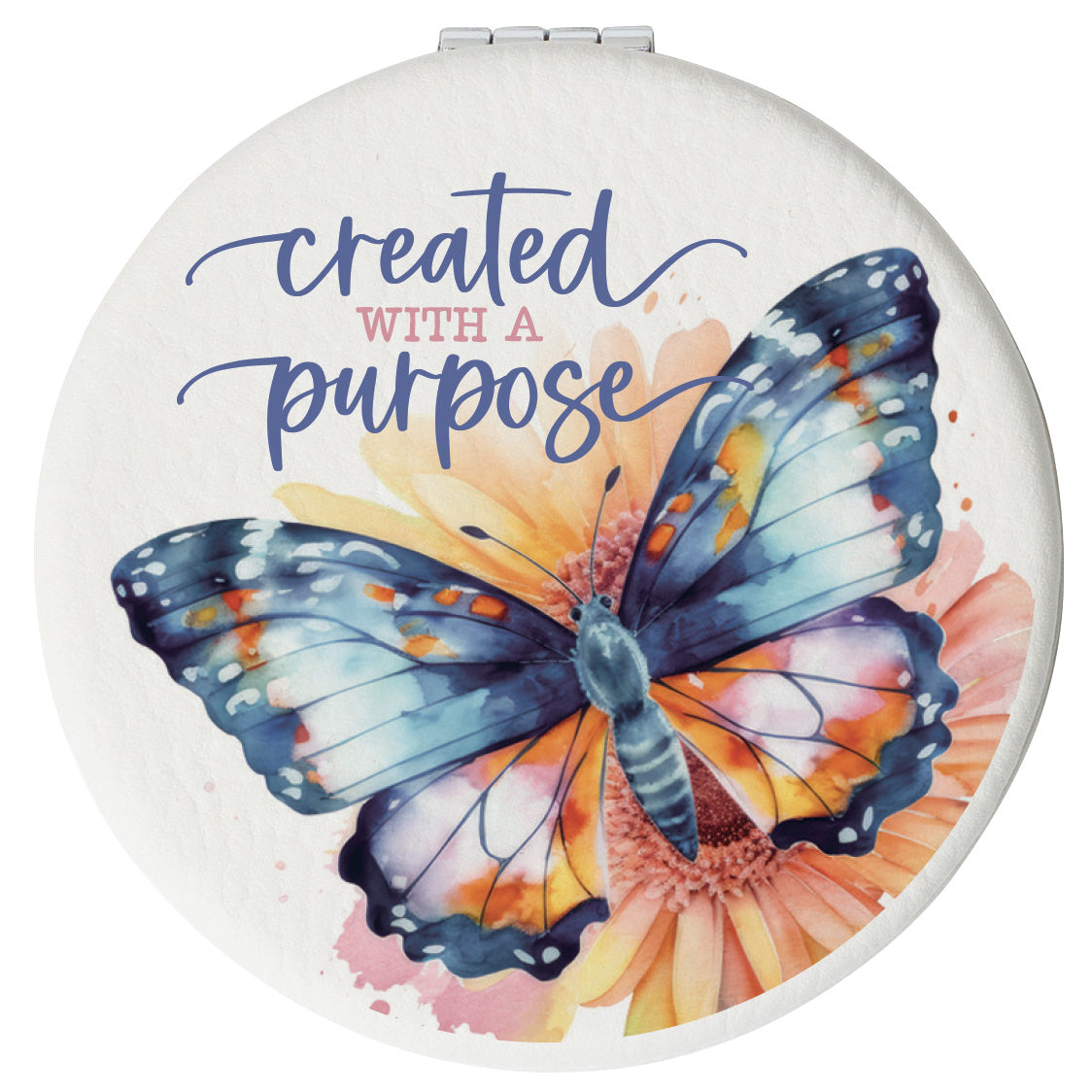 Round compact mirror with a leatherette cover, full-color “Created With a Purpose” design, 1X and 2X mirrors inside, and magnetic closure.