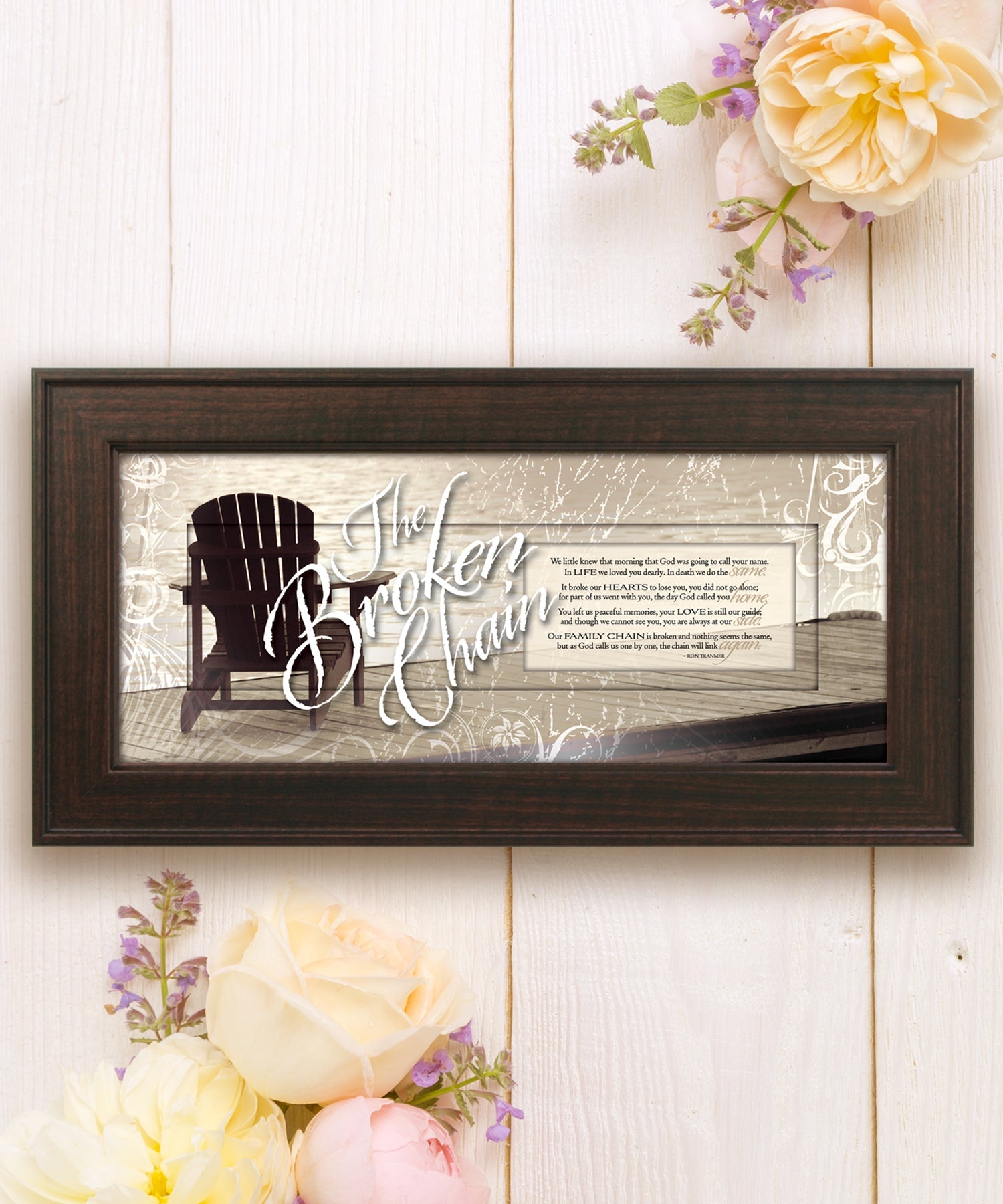The Broken Chain Framed Art with the inspirational quote is displayed prominently. The design includes elegant typography on a textured background, framed in a classic wood frame with a sophisticated finish.