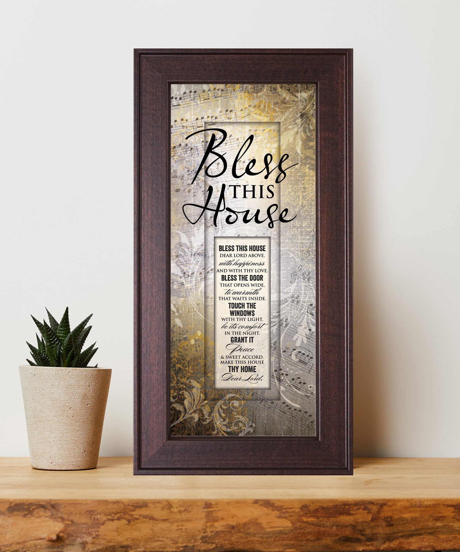 Bless This House Framed Art with the inspirational quote is displayed prominently. The design includes elegant typography on a textured background, framed in a classic wood frame with a sophisticated finish.