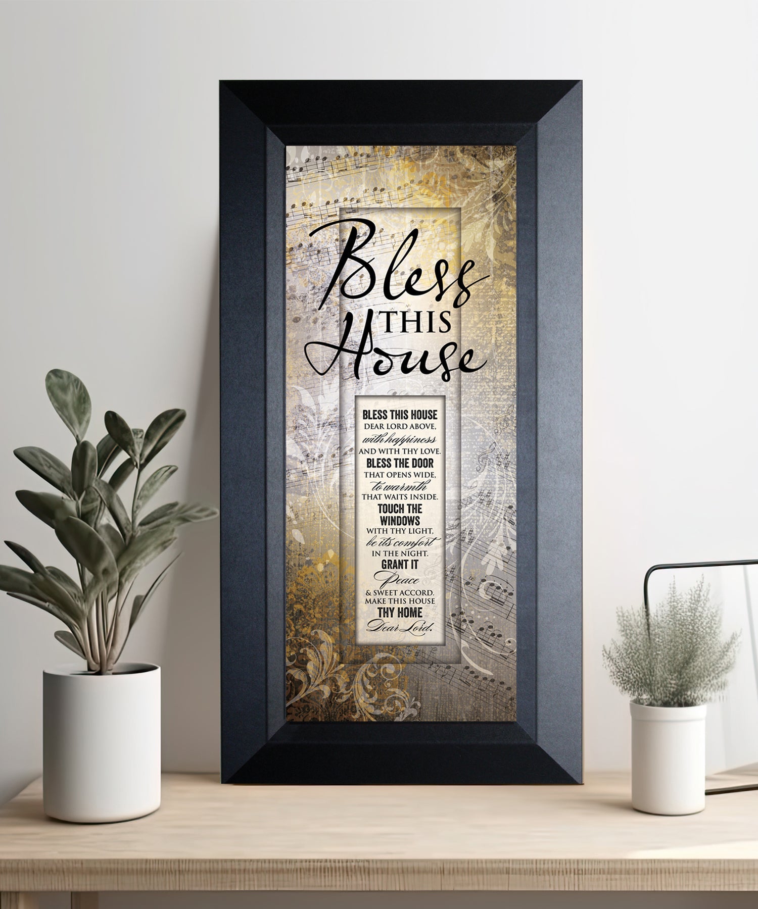 Bless This House Framed Art with the inspirational quote is displayed prominently. The design includes elegant typography on a textured background, framed in a classic wood frame with a sophisticated finish.
