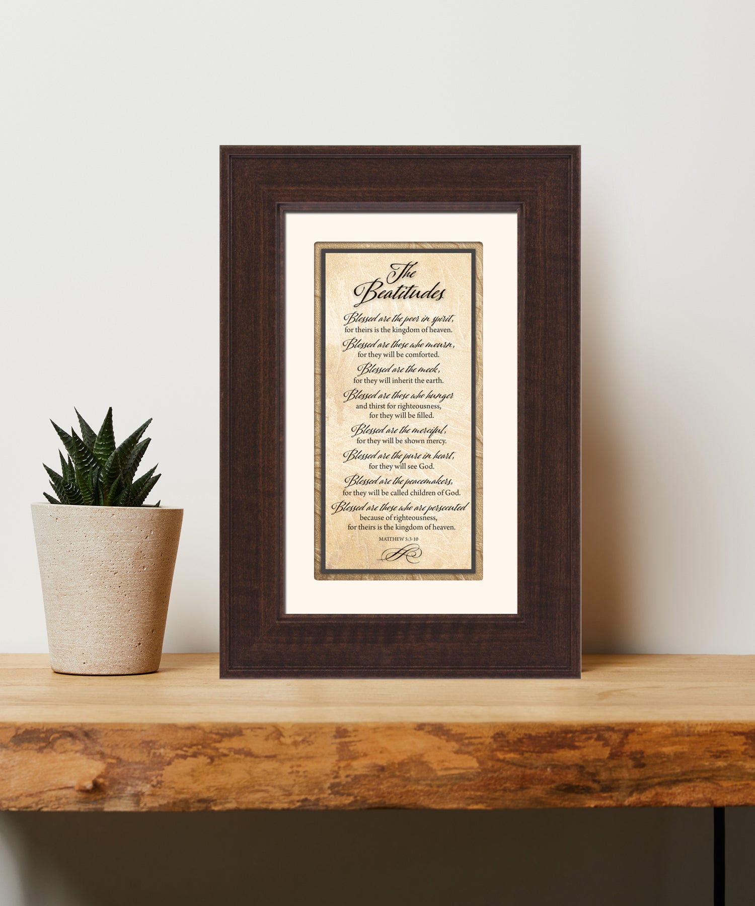 The Beatitudes Framed Art has elegant typography and a neutral design. It is framed in a classic wood frame with a warm finish and double matting.