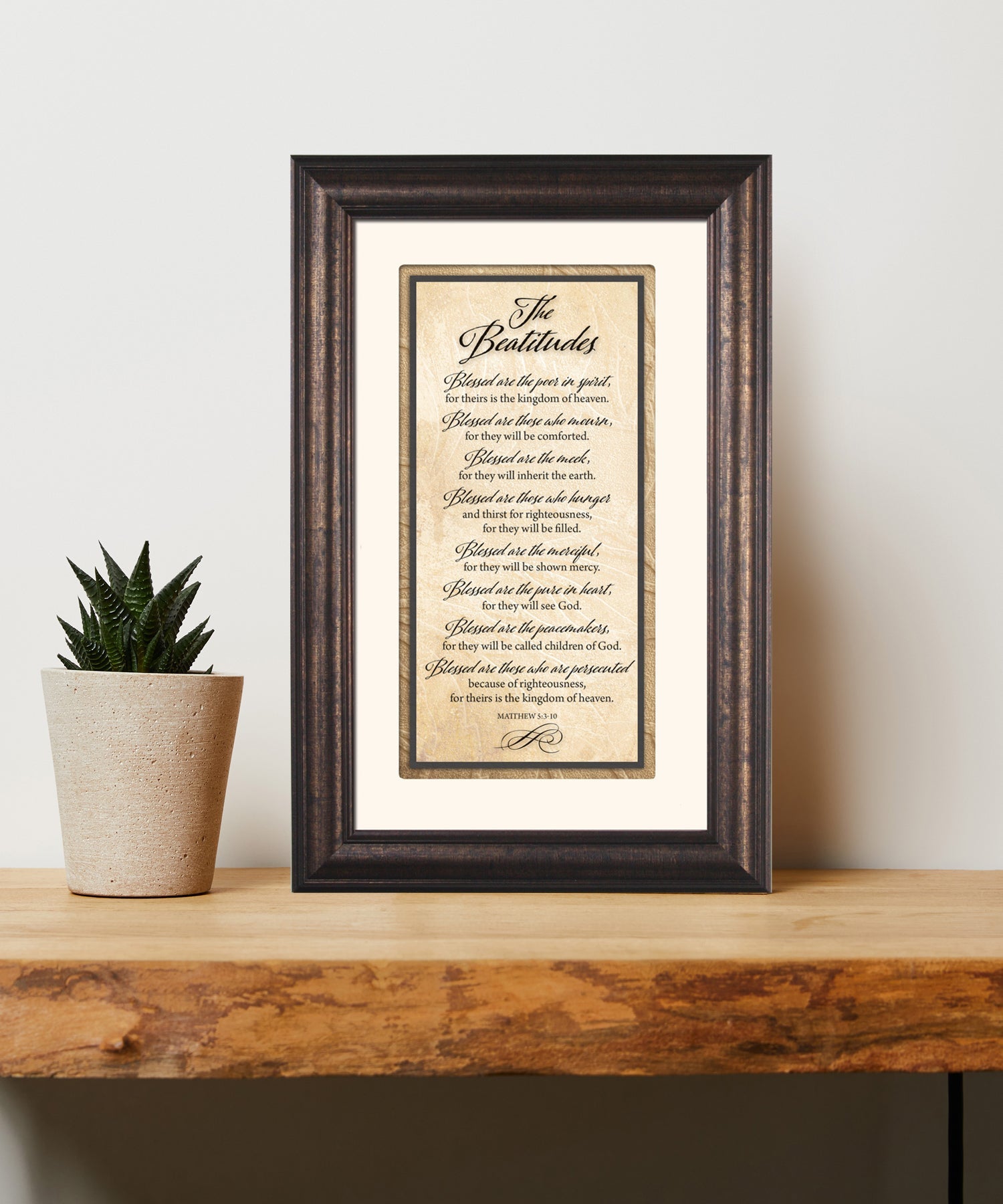 The Beatitudes Framed Art has elegant typography and a neutral design. It is framed in a classic wood frame with a warm finish and double matting.