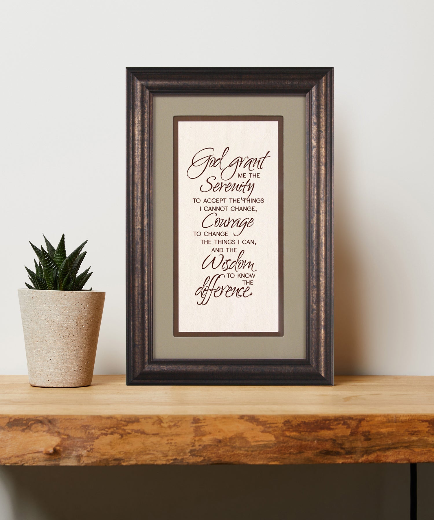 Serenity Prayer Framed Art has elegant typography and a neutral design. It is framed in a classic wood frame with a warm finish and double matting.
