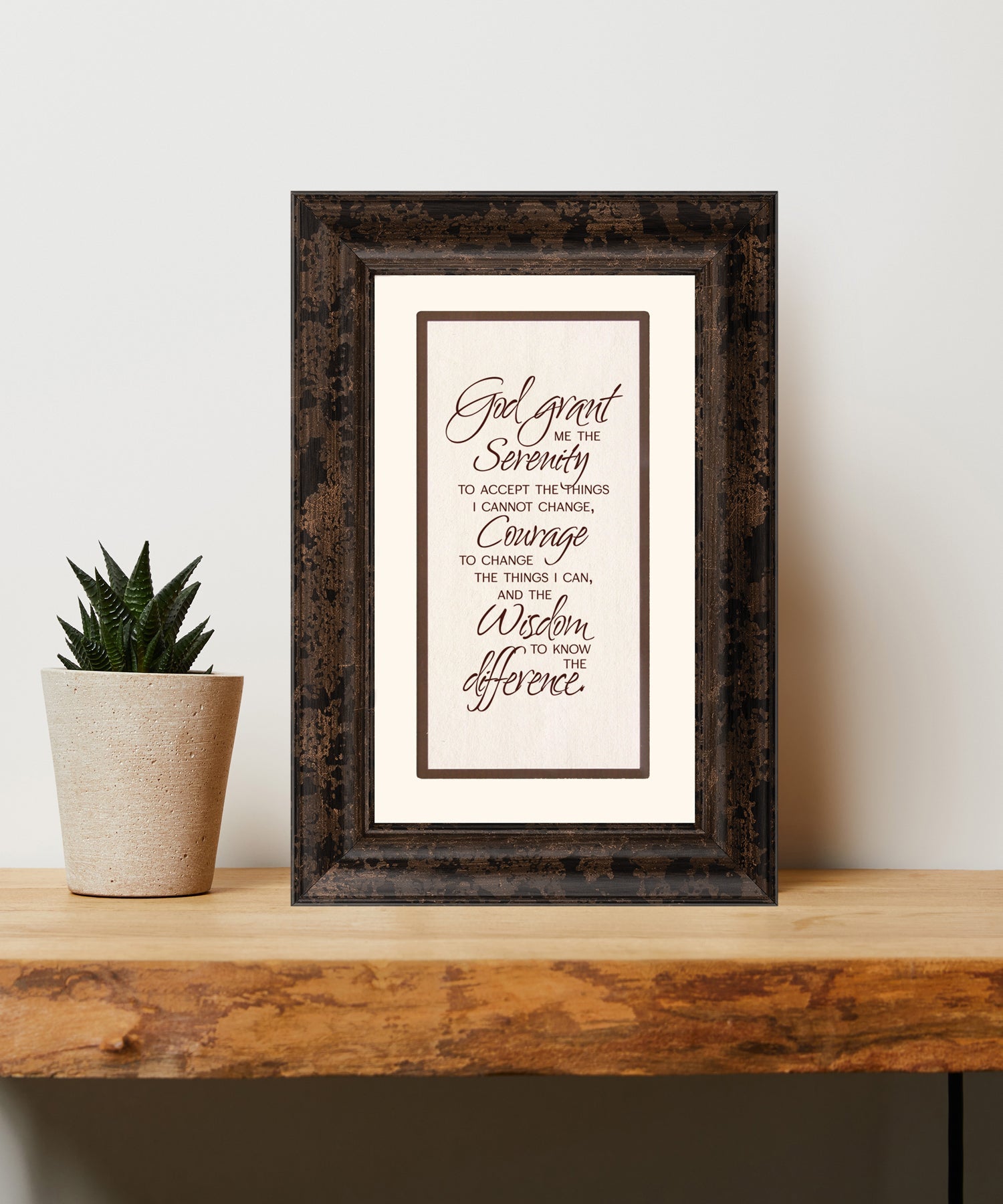 Serenity Prayer Framed Art has elegant typography and a neutral design. It is framed in a classic wood frame with a warm finish and double matting.