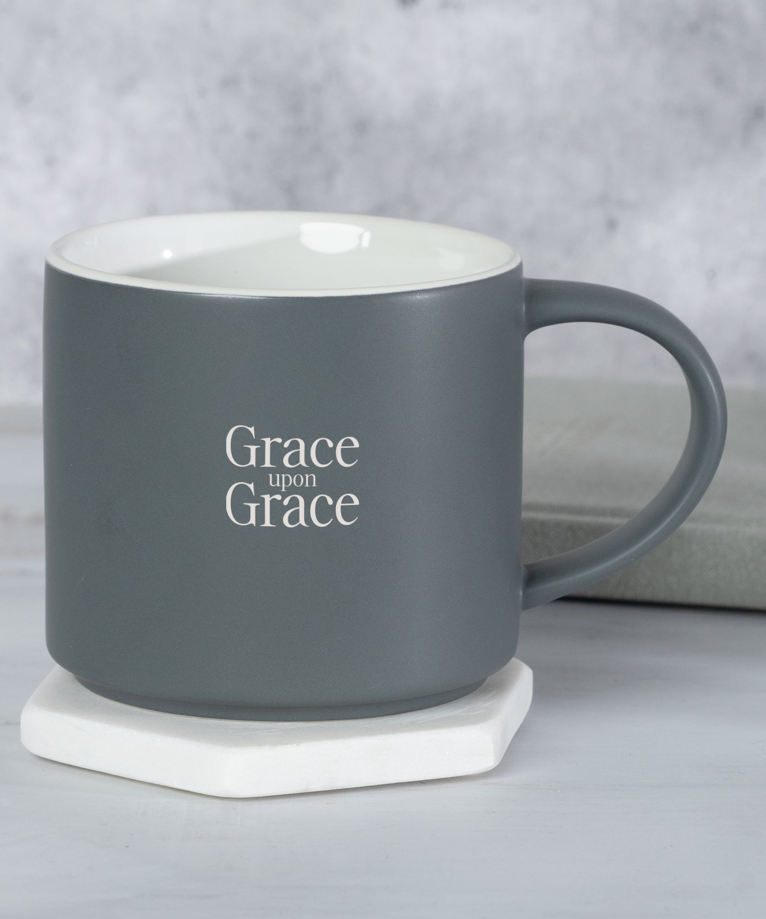 Grace Upon Grace inspirational Christian stacking mug with modern charcoal exterior and cream interior