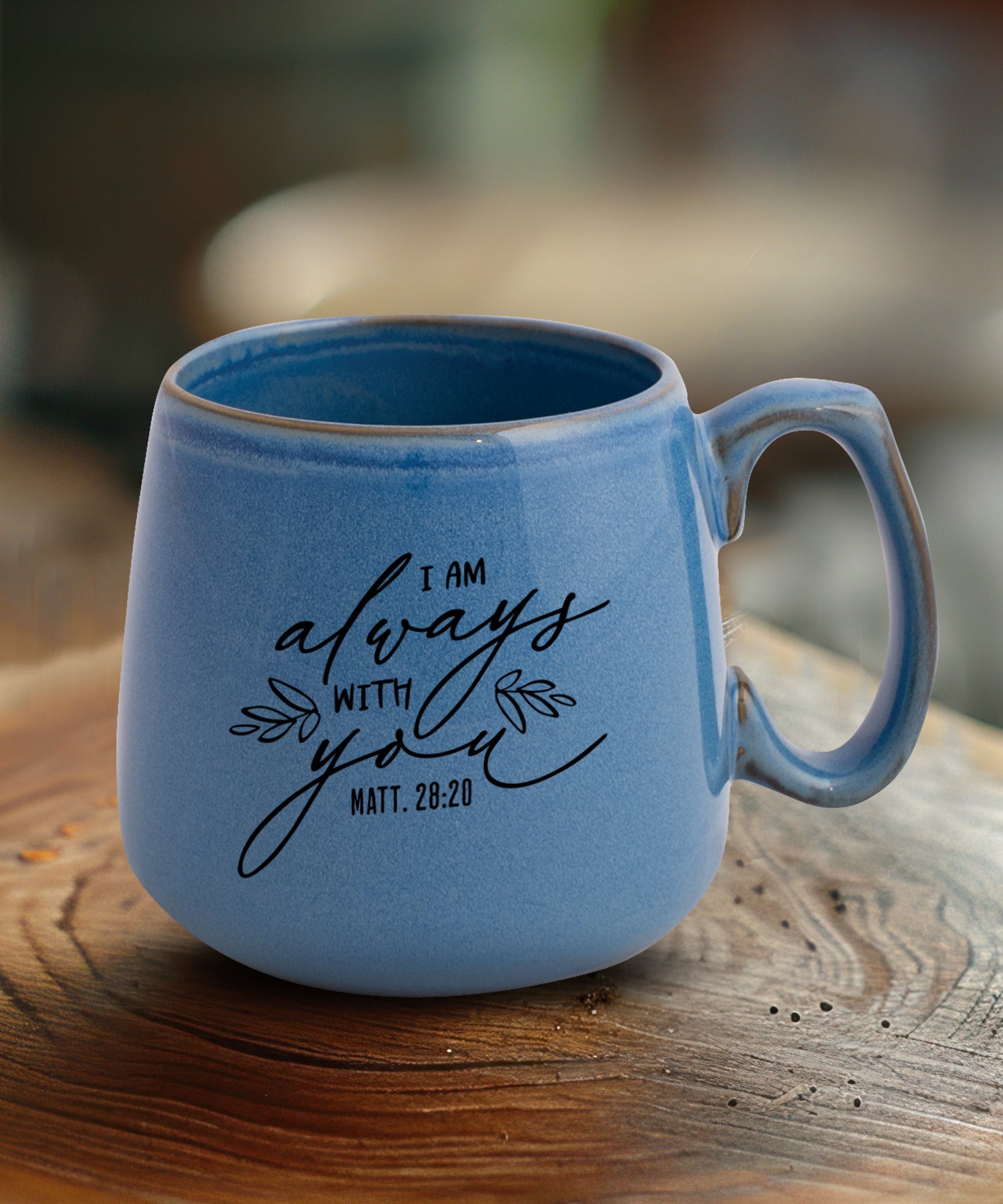 Ceramic mug with a broad base featuring I Am Always With You.