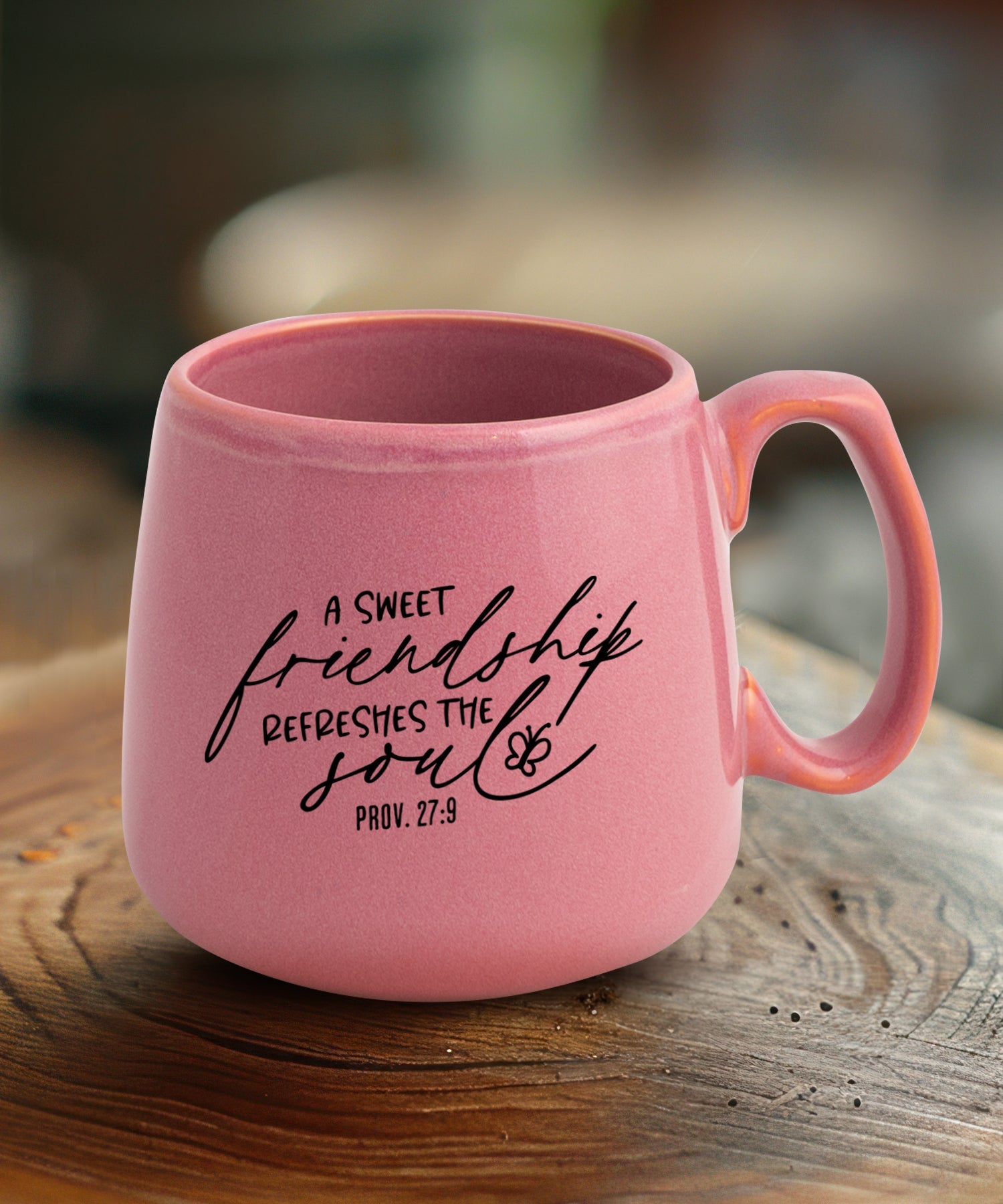 Ceramic mug with a broad base featuring A Sweet Friendship.